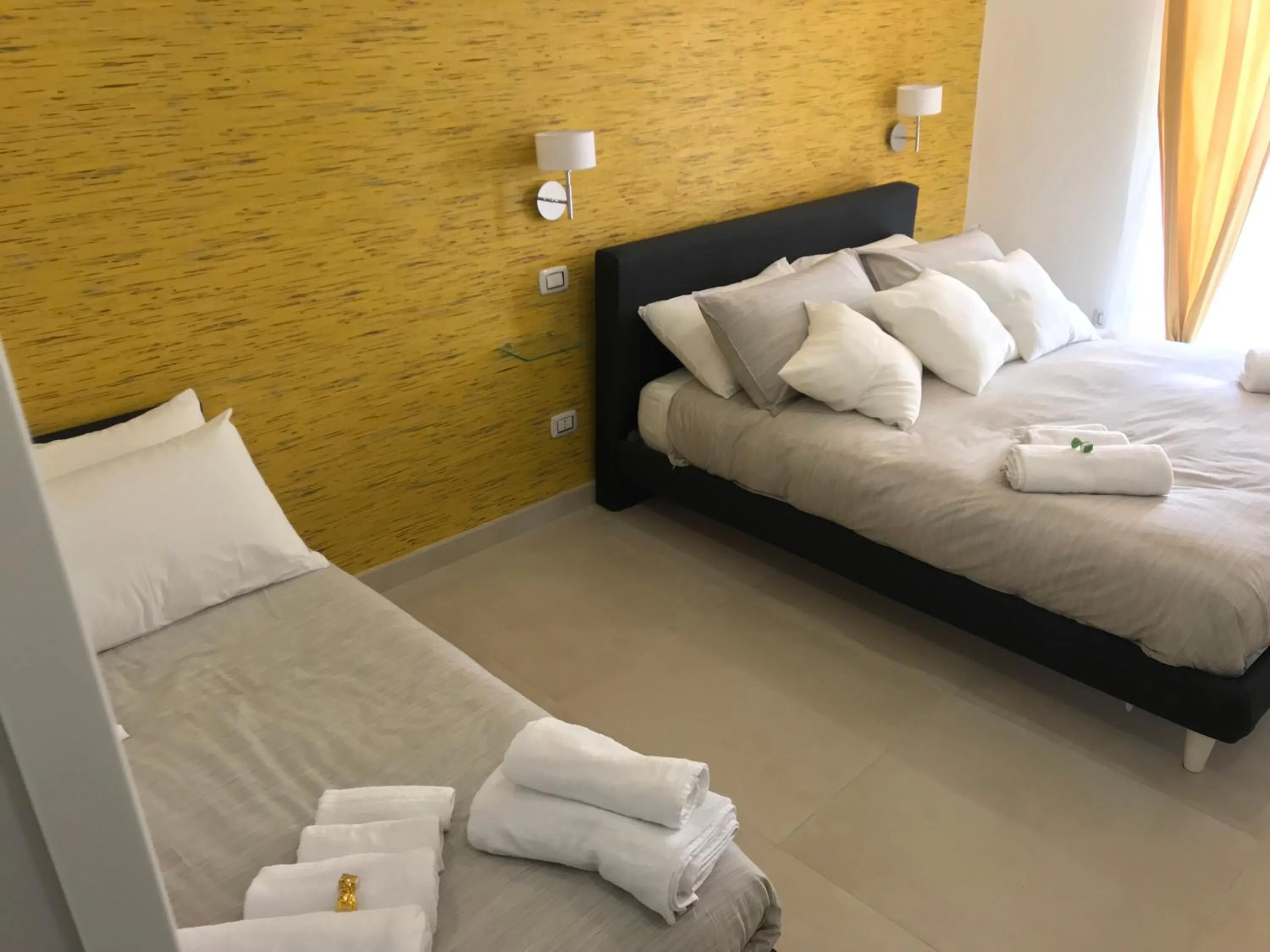 Bedroom, Bed in Terrazza Aragon Room and SPA