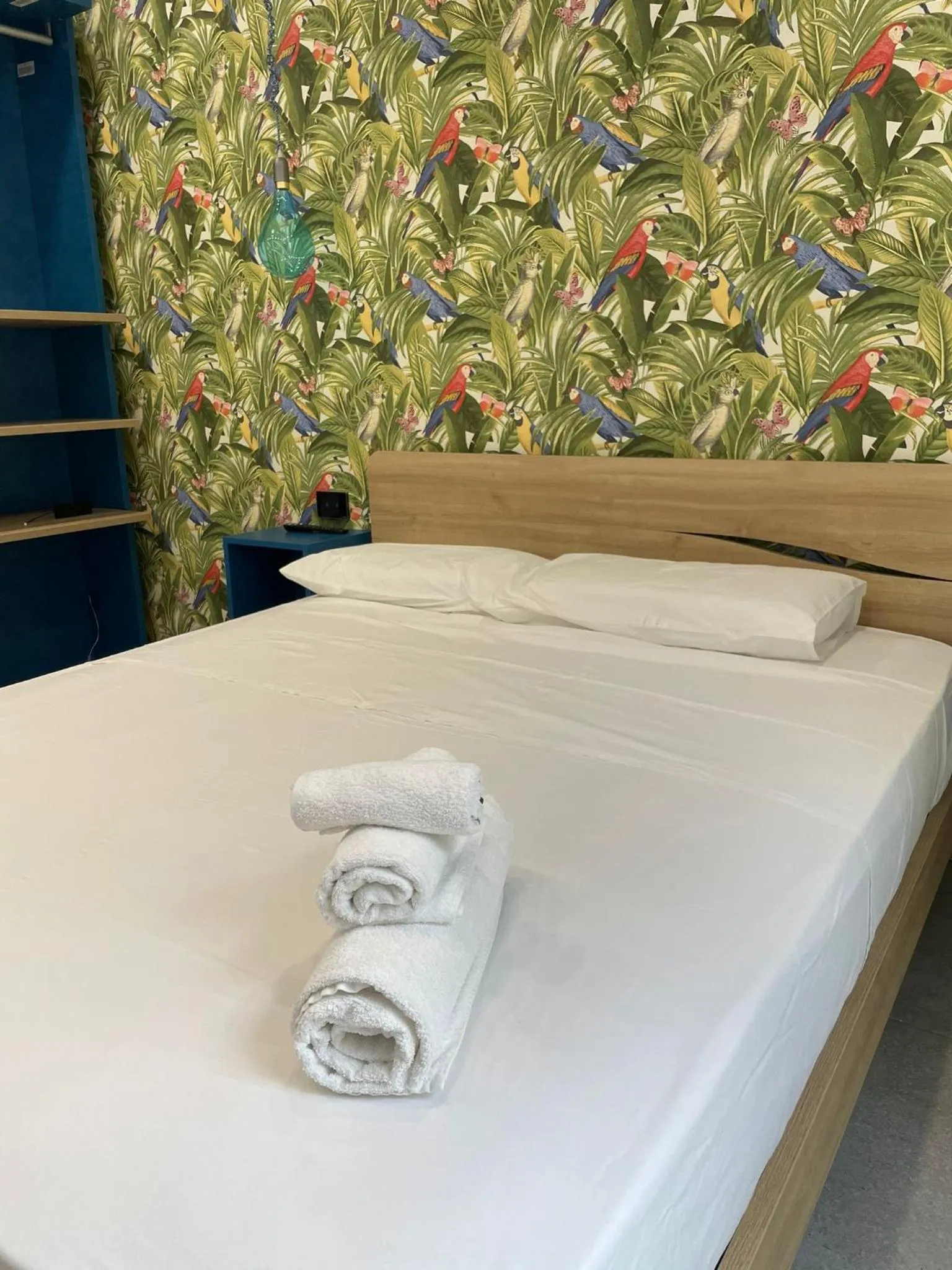 Bed in Terrazza Aragon Room and SPA