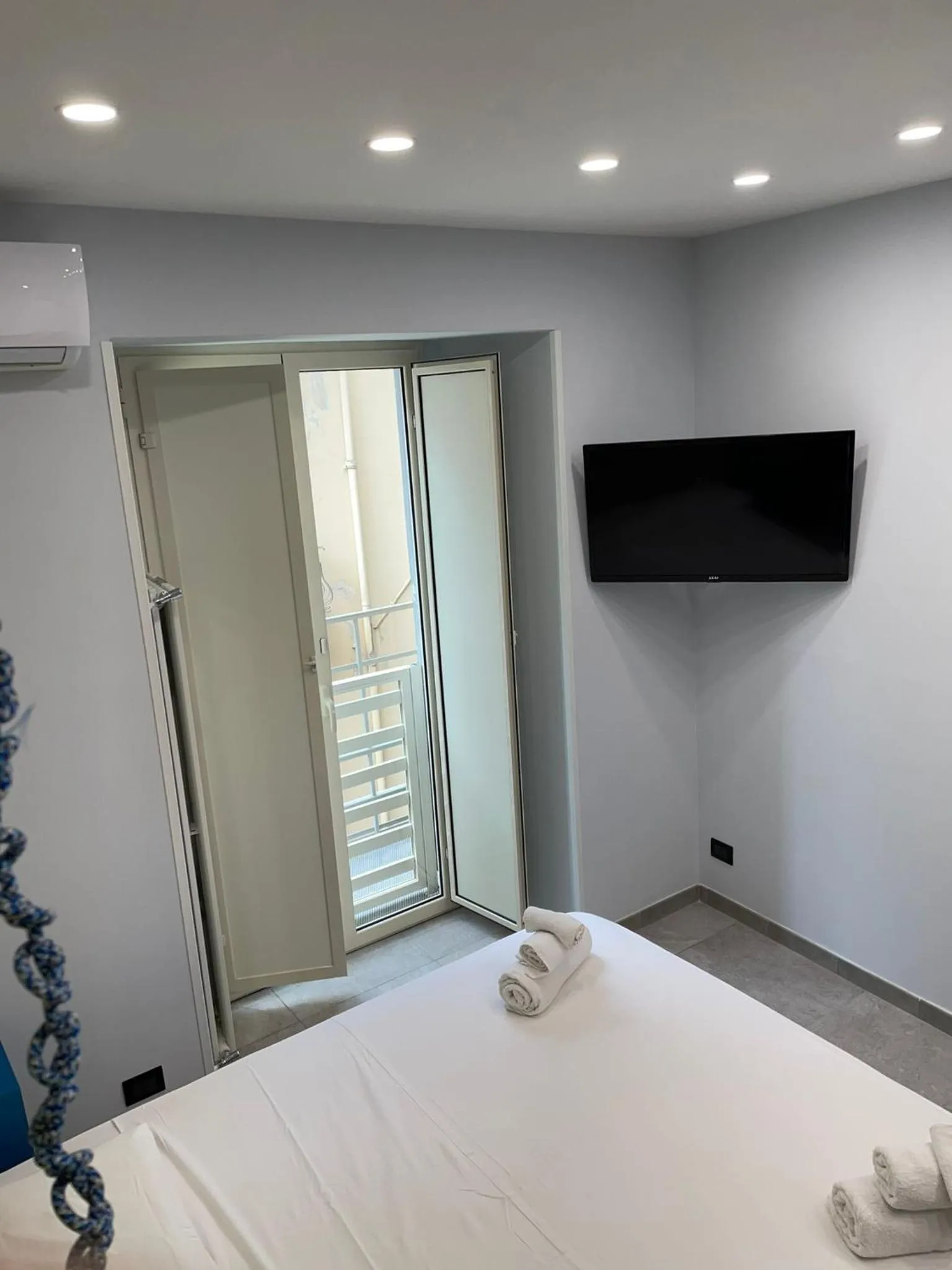 TV and multimedia, Bed in Terrazza Aragon Room and SPA