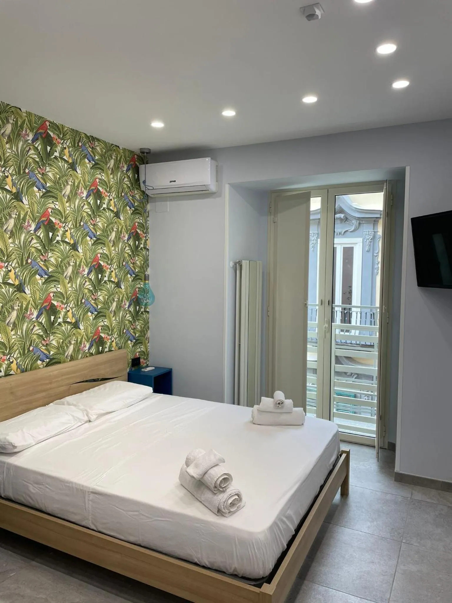 Bedroom, Bed in Terrazza Aragon Room and SPA