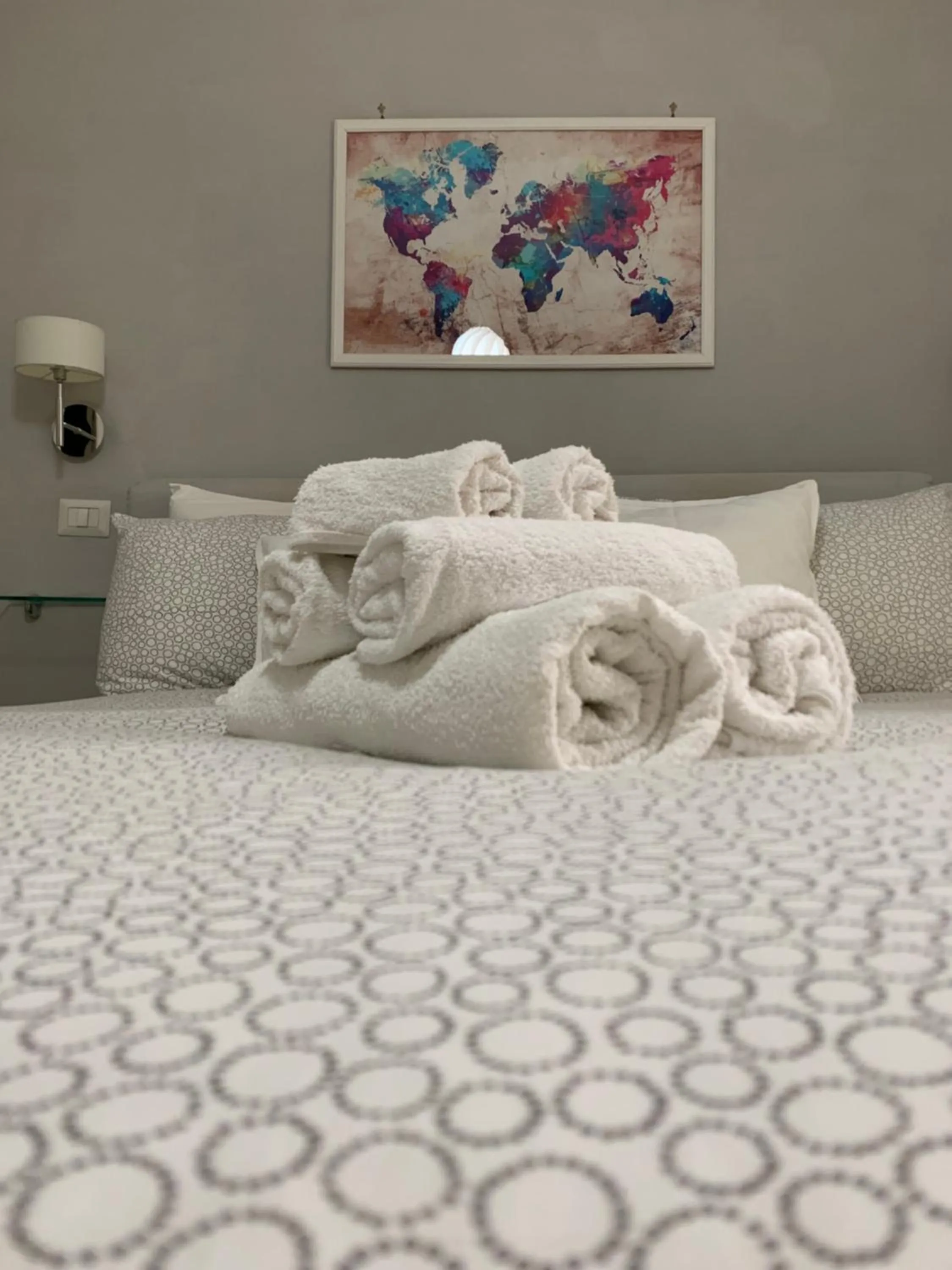 Bed in Terrazza Aragon Room and SPA