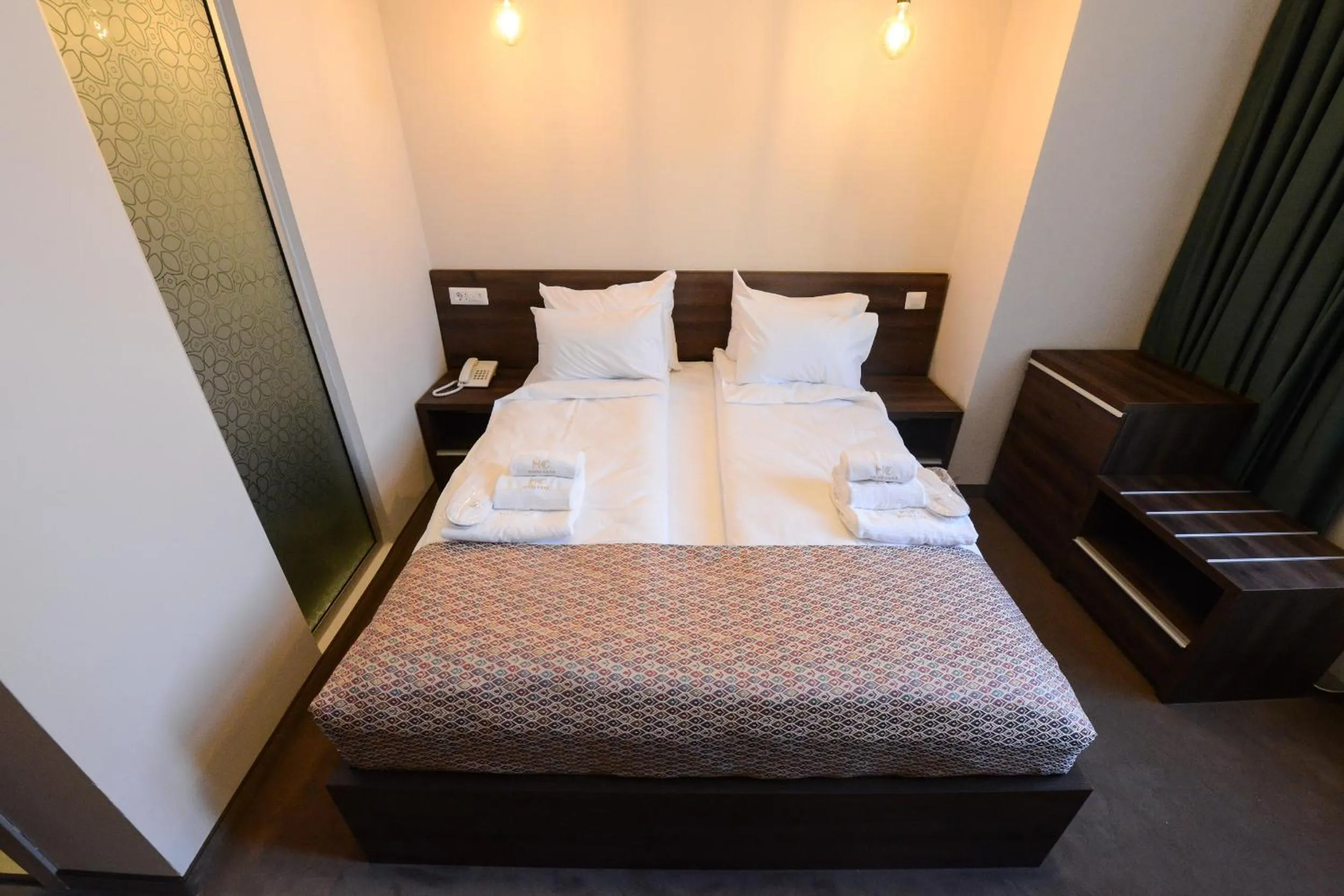 Bed in Hotel Cara 28