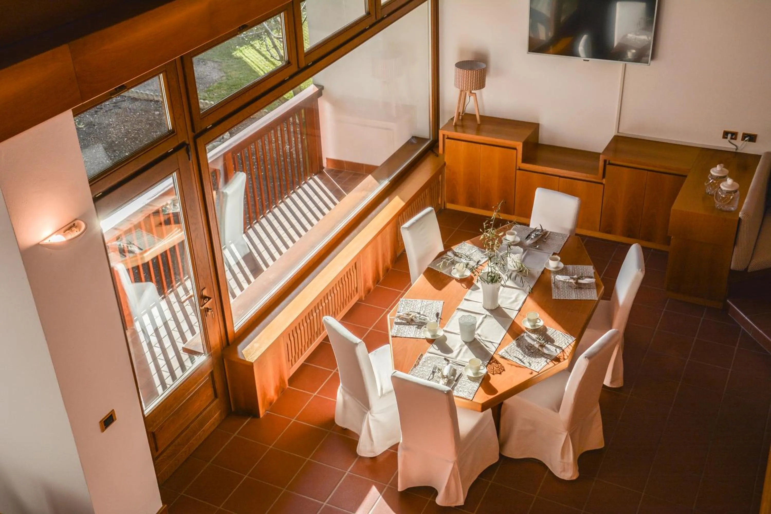 Communal lounge/ TV room in Villa degli Olivi Relais