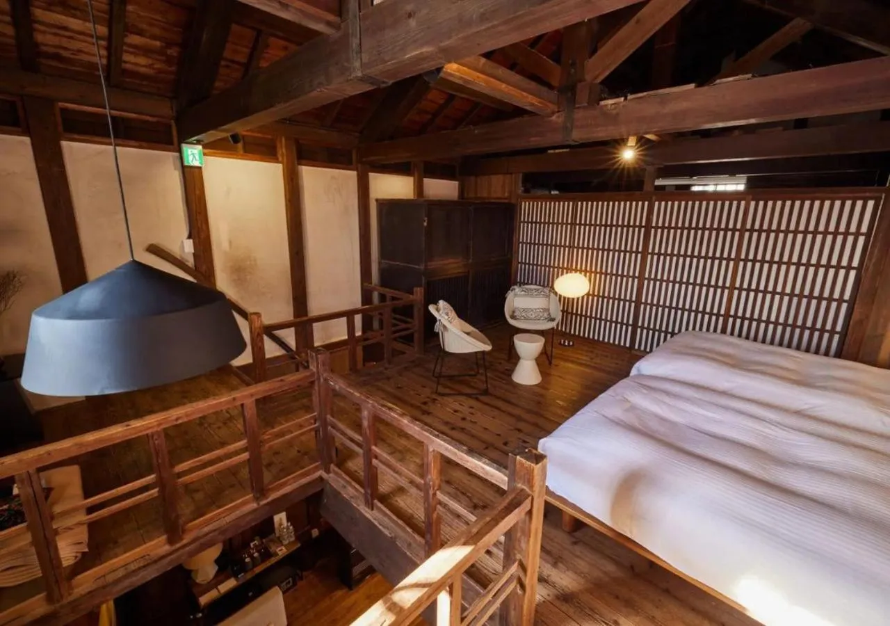 Bed in NIPPONIA Sawara Merchant Town Hotel