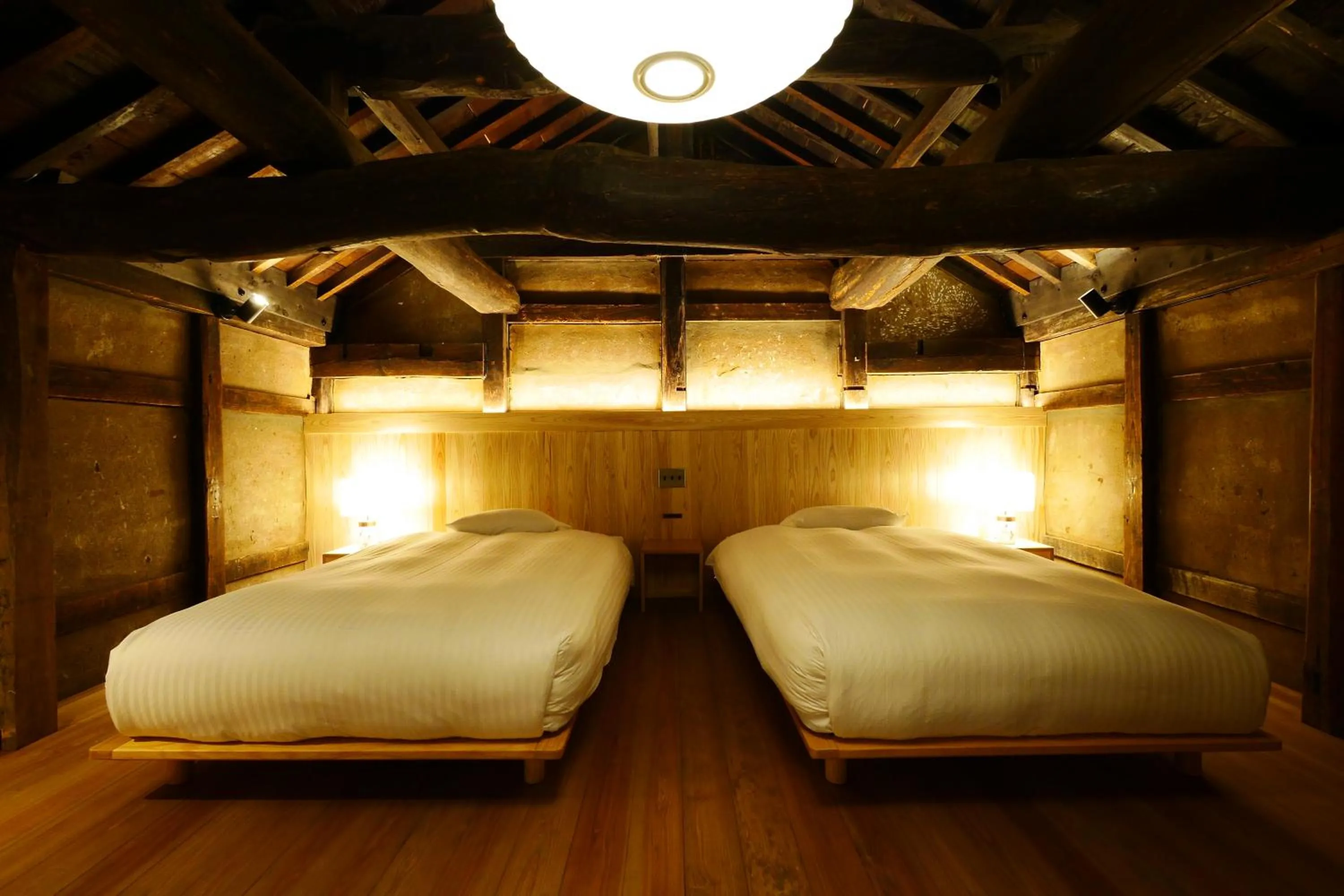 Bed in NIPPONIA Sawara Merchant Town Hotel