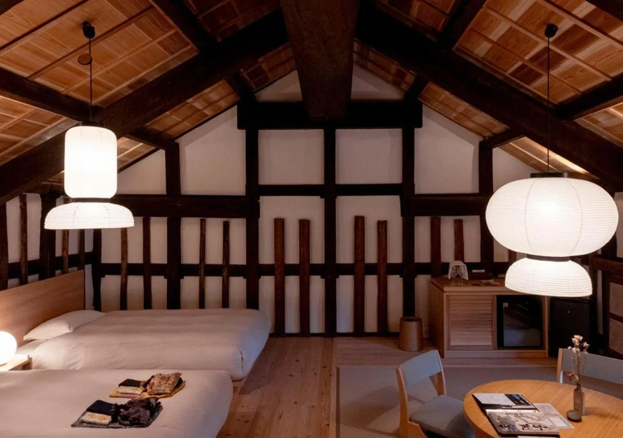 Bed in NIPPONIA Sawara Merchant Town Hotel