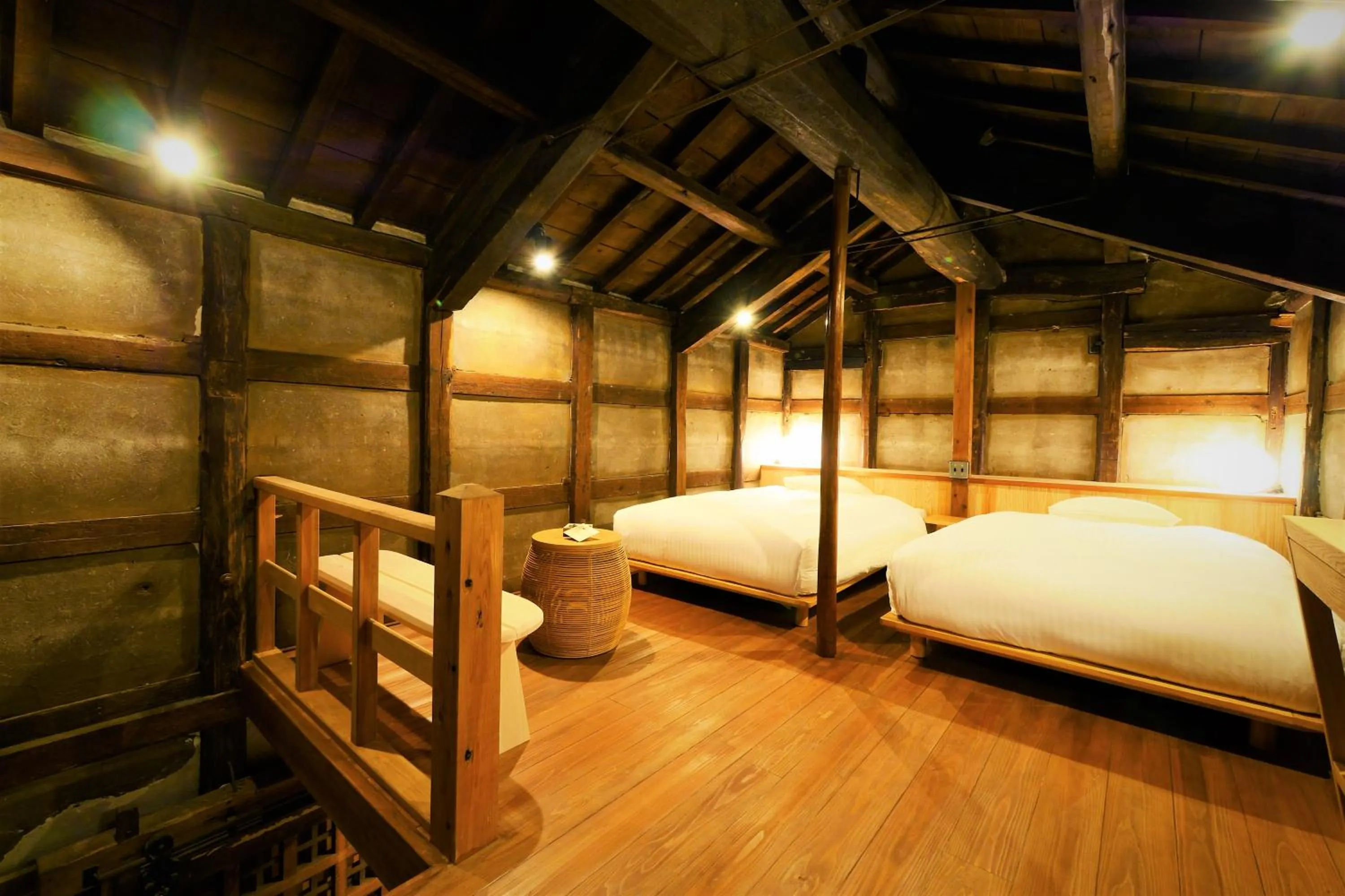 Bed in NIPPONIA Sawara Merchant Town Hotel