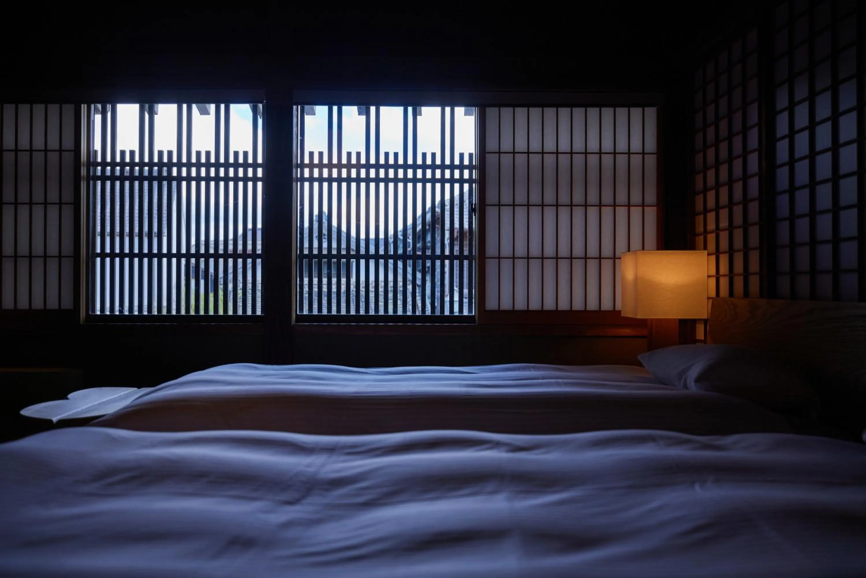 Bed in NIPPONIA Sawara Merchant Town Hotel