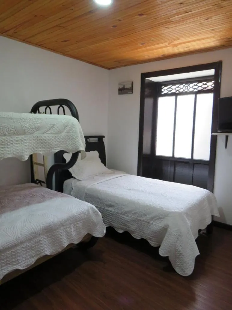 Photo of the whole room, Bed in Hotel Aroma del Bosque Posada Cafe