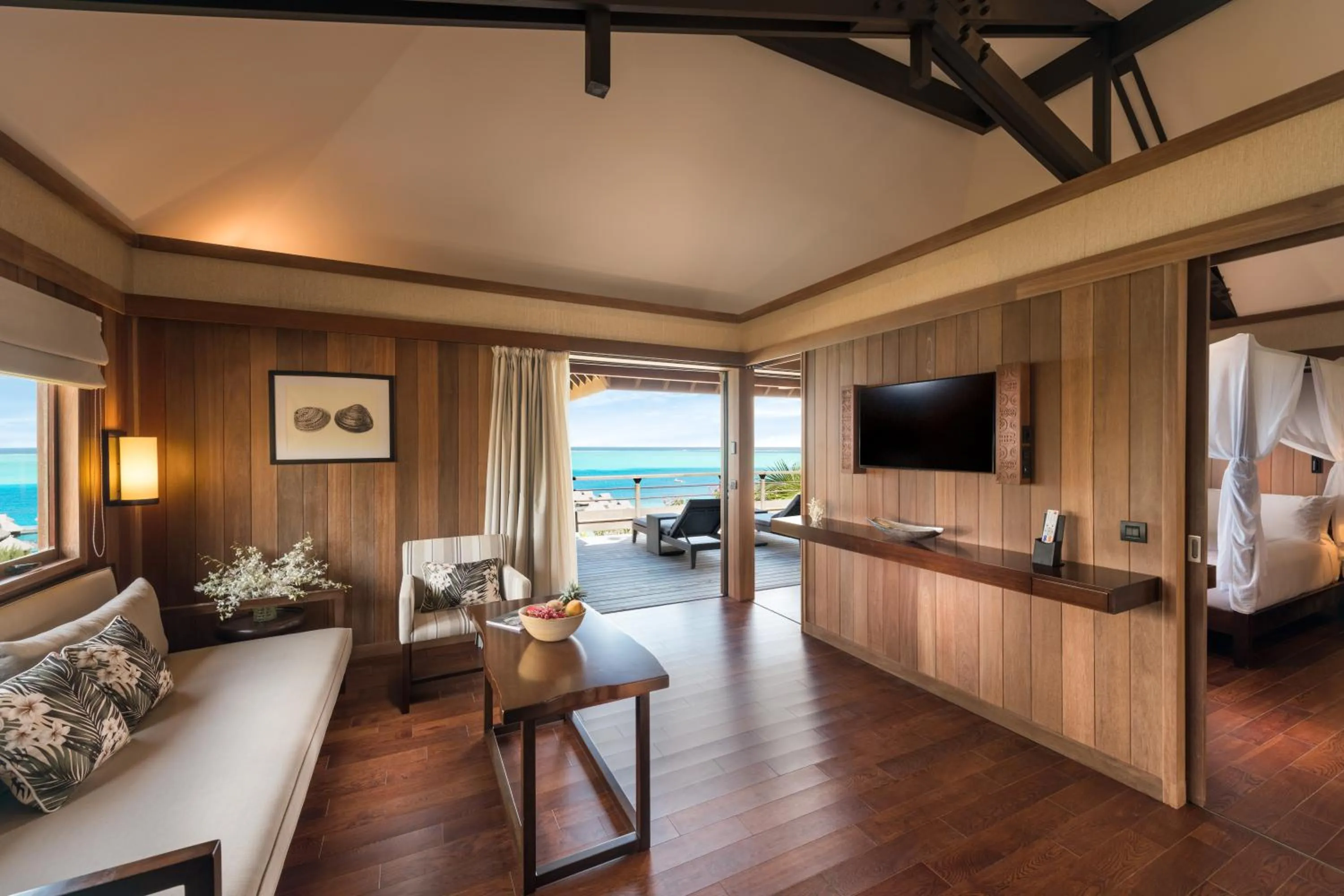 Communal lounge/ TV room in Conrad Bora Bora Nui