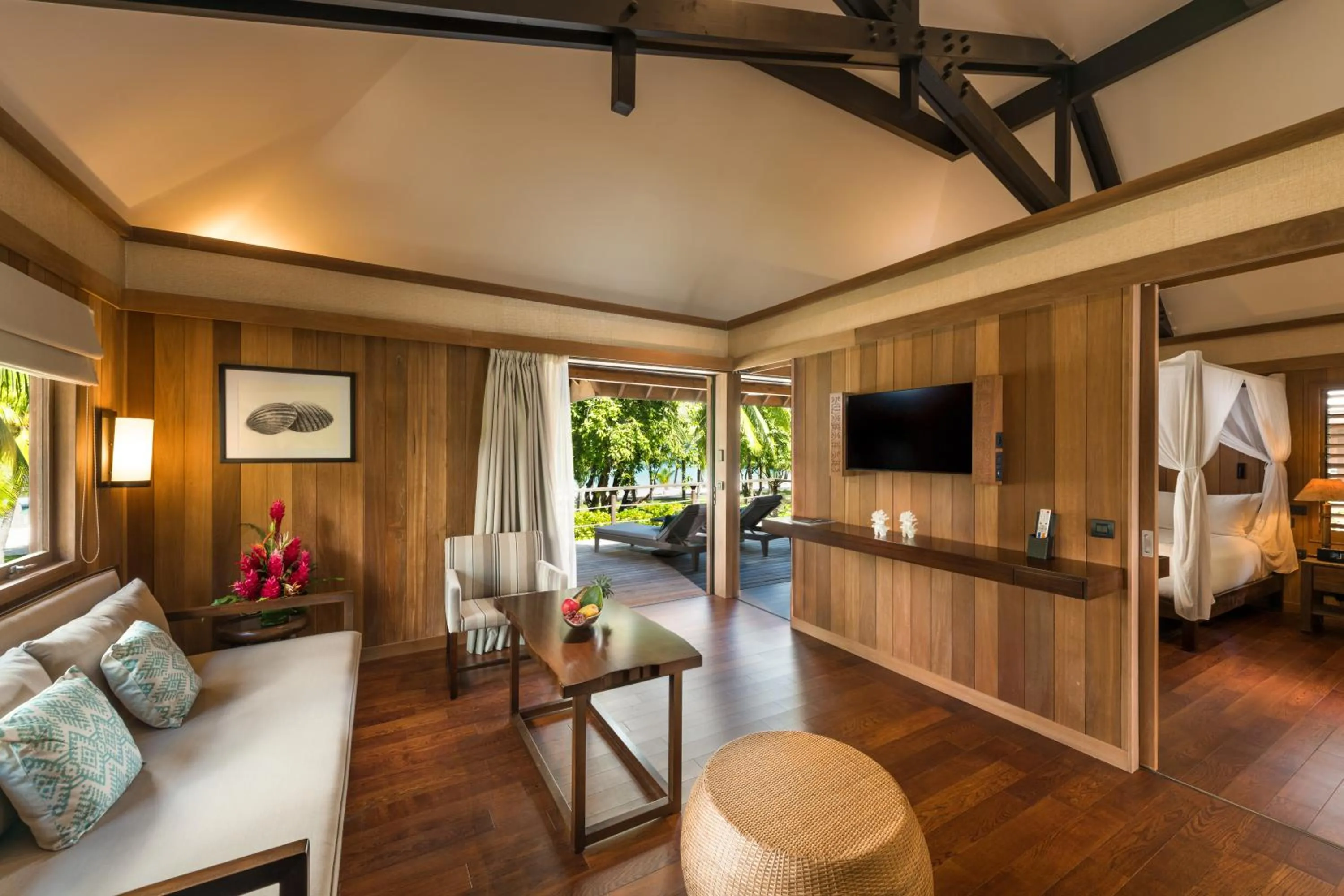 Communal lounge/ TV room in Conrad Bora Bora Nui
