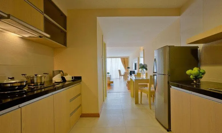 Kitchen or kitchenette in Jinhold Apartment Hotel