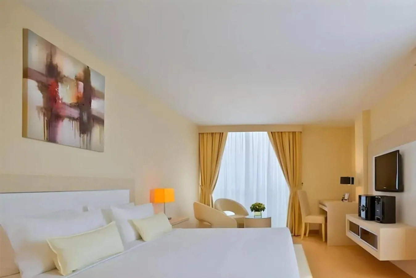 Bed in Blanco Apartment Hotel