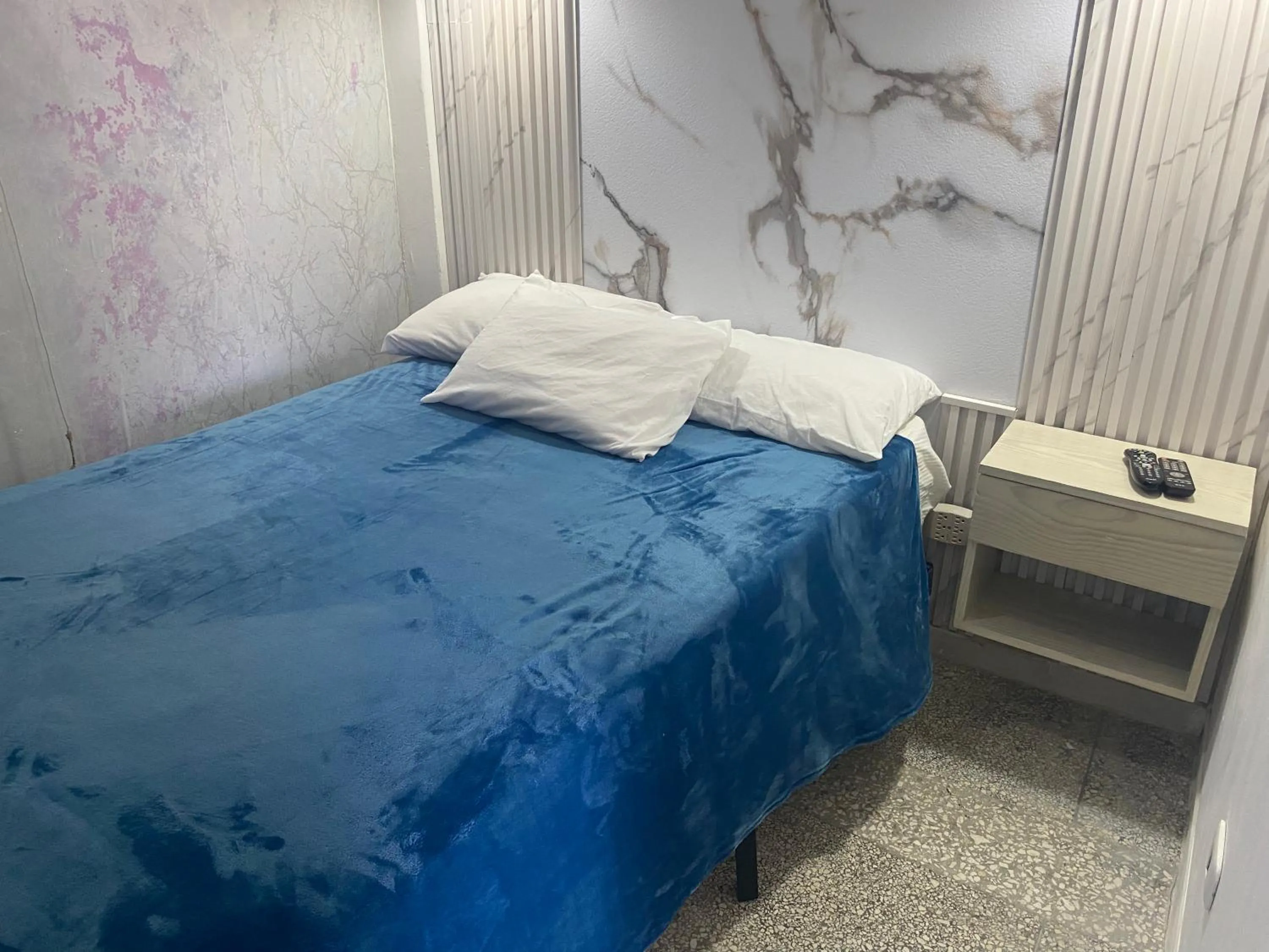 Bed in Apartamentos Magallanes Romana