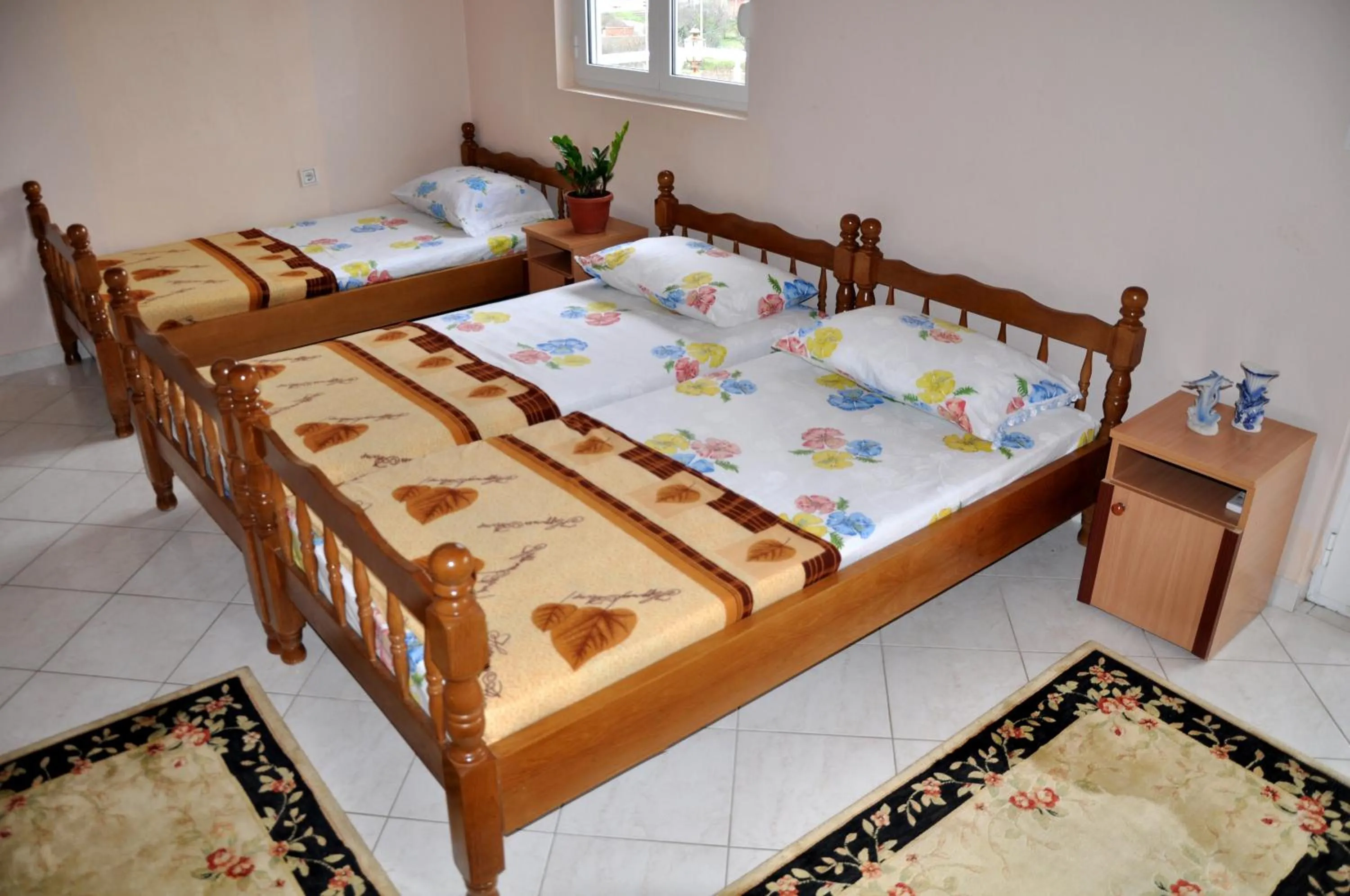 Bed in Apartments Perezaj