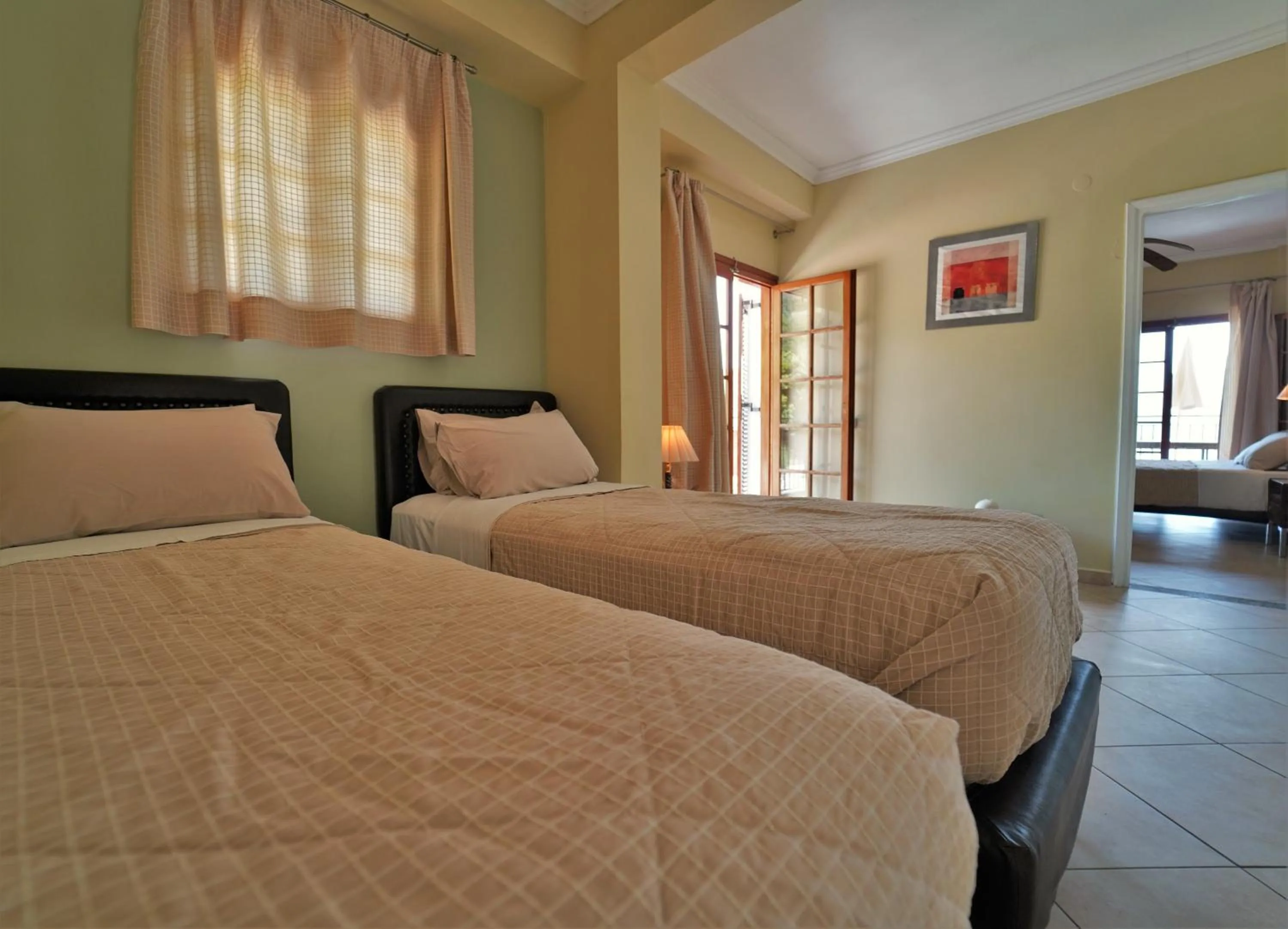 Bed in Bella Vista Hotel Studios & Apartments