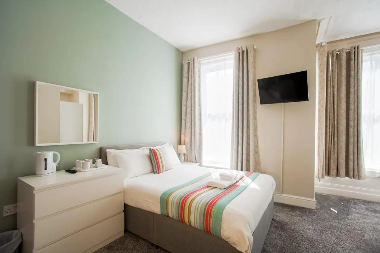 Bed in The Georgian Hollies Hotel