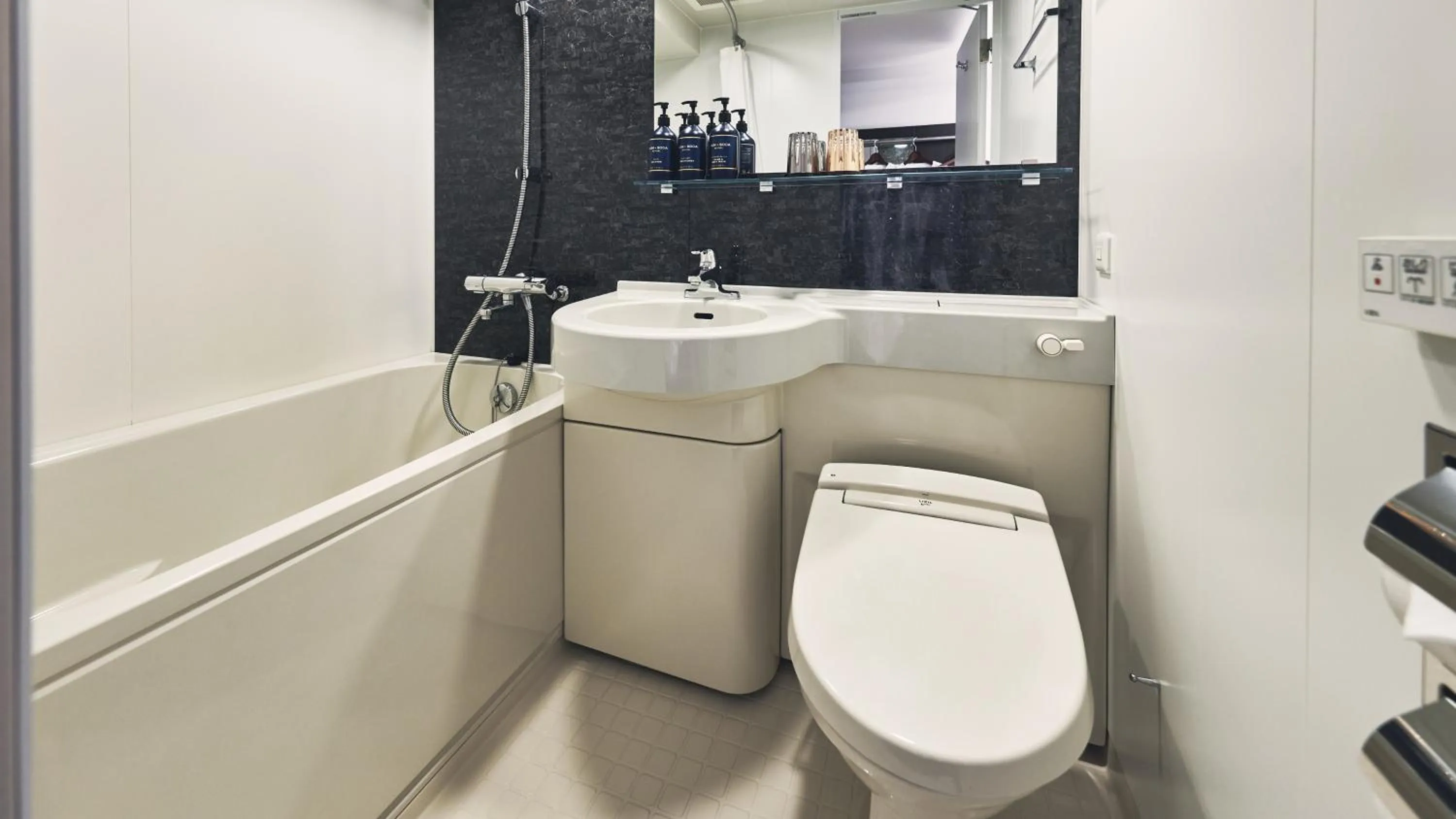 Bathroom in Garner Hotel Osaka Honmachi Midosuji by IHG