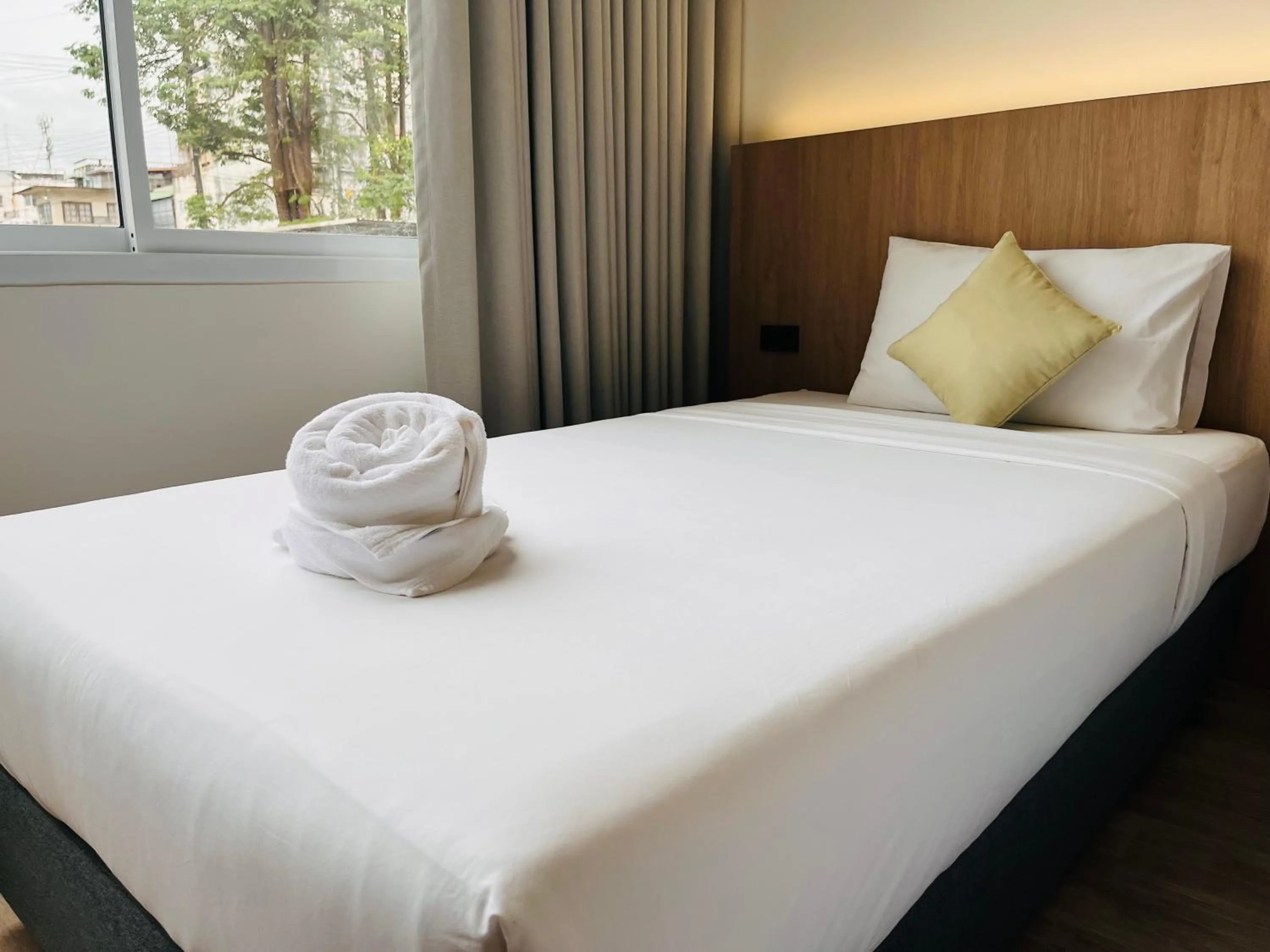 Bed in S2S Queen Trang Hotel