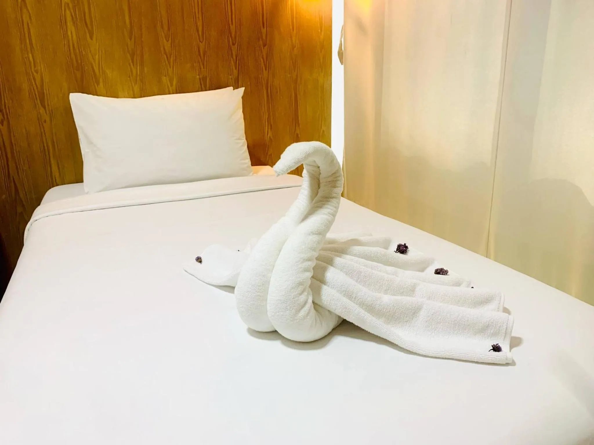 Bed in S2S Queen Trang Hotel