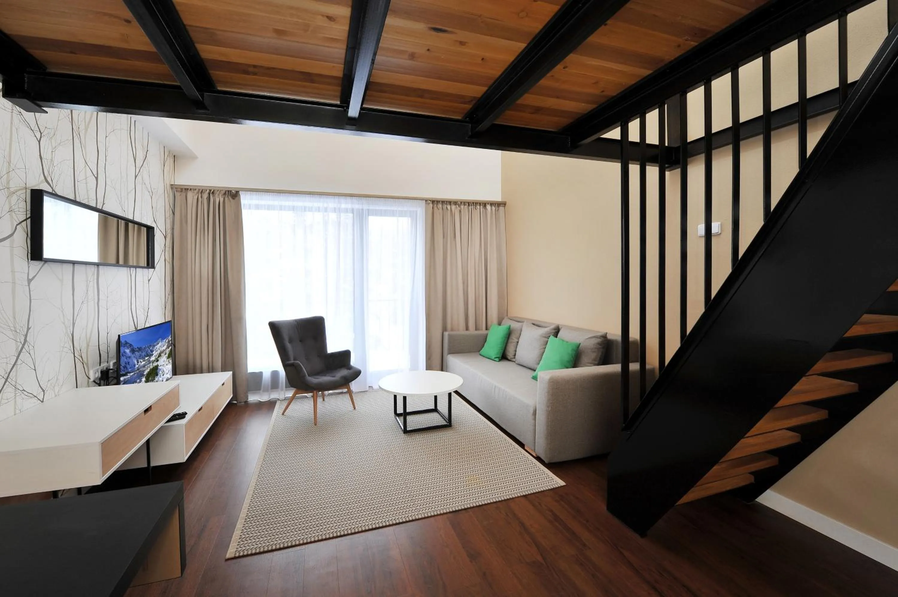 Living room in APLEND Vila Olívia