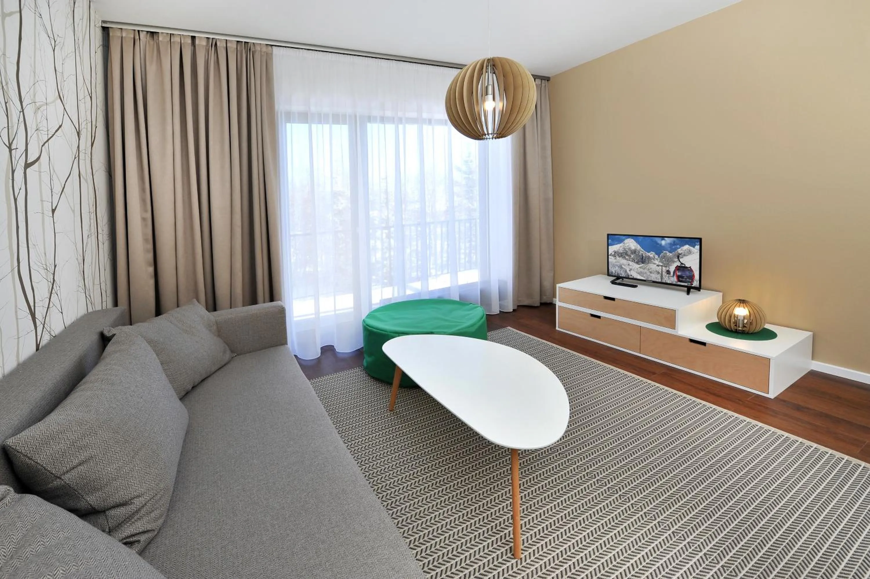 Living room in APLEND Vila Olívia