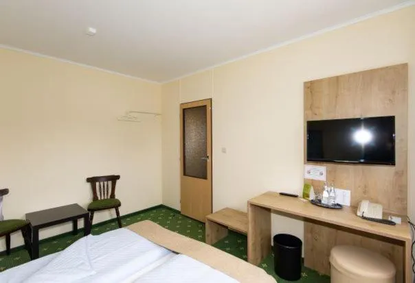 Photo of the whole room, Bed in Spreewaldhotel Garni Raddusch