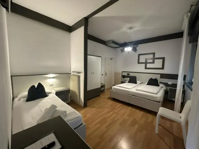 Photo of the whole room, Bed in Athos Hotel