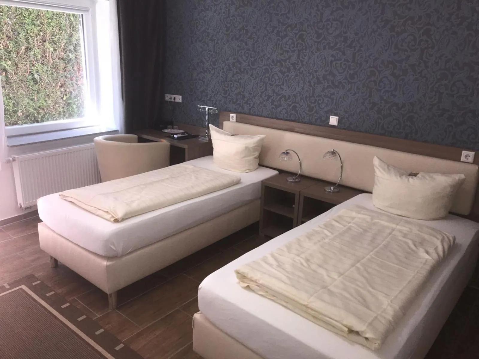 Photo of the whole room, Bed in Cityhotel Ahlen Garni