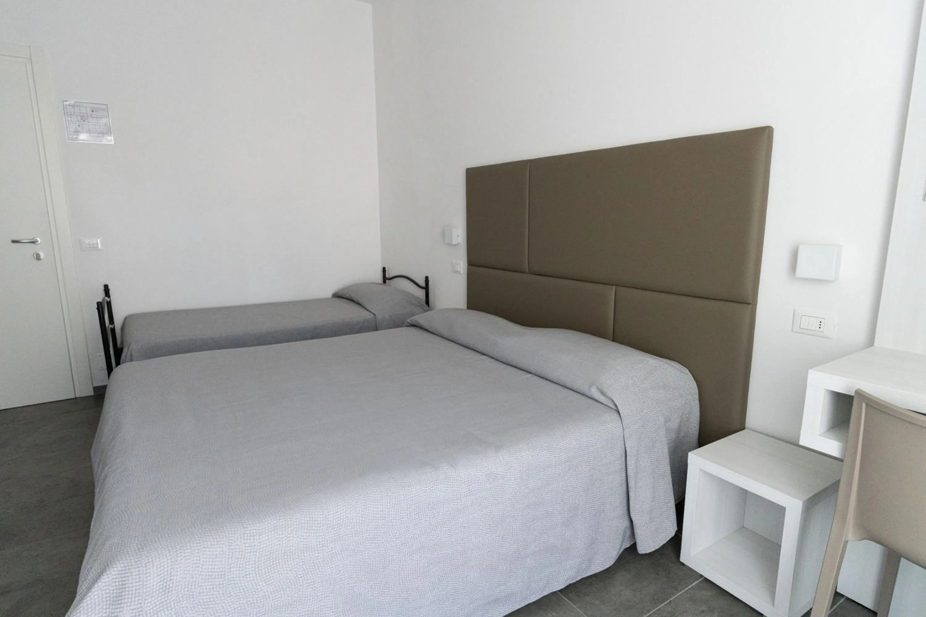 Bed in Hotel Eugenio