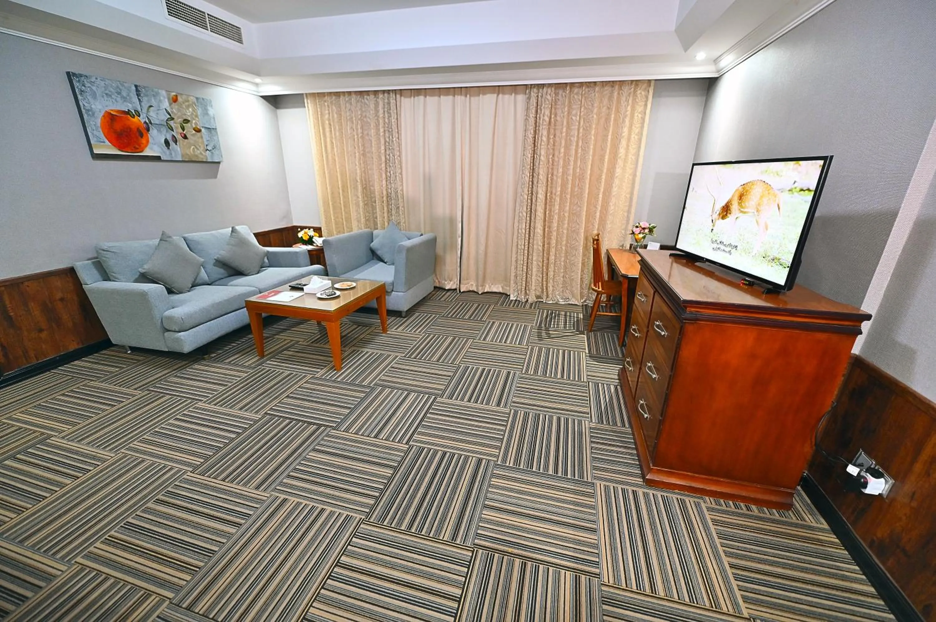 Living room in Ewan Ajman Suites Hotel