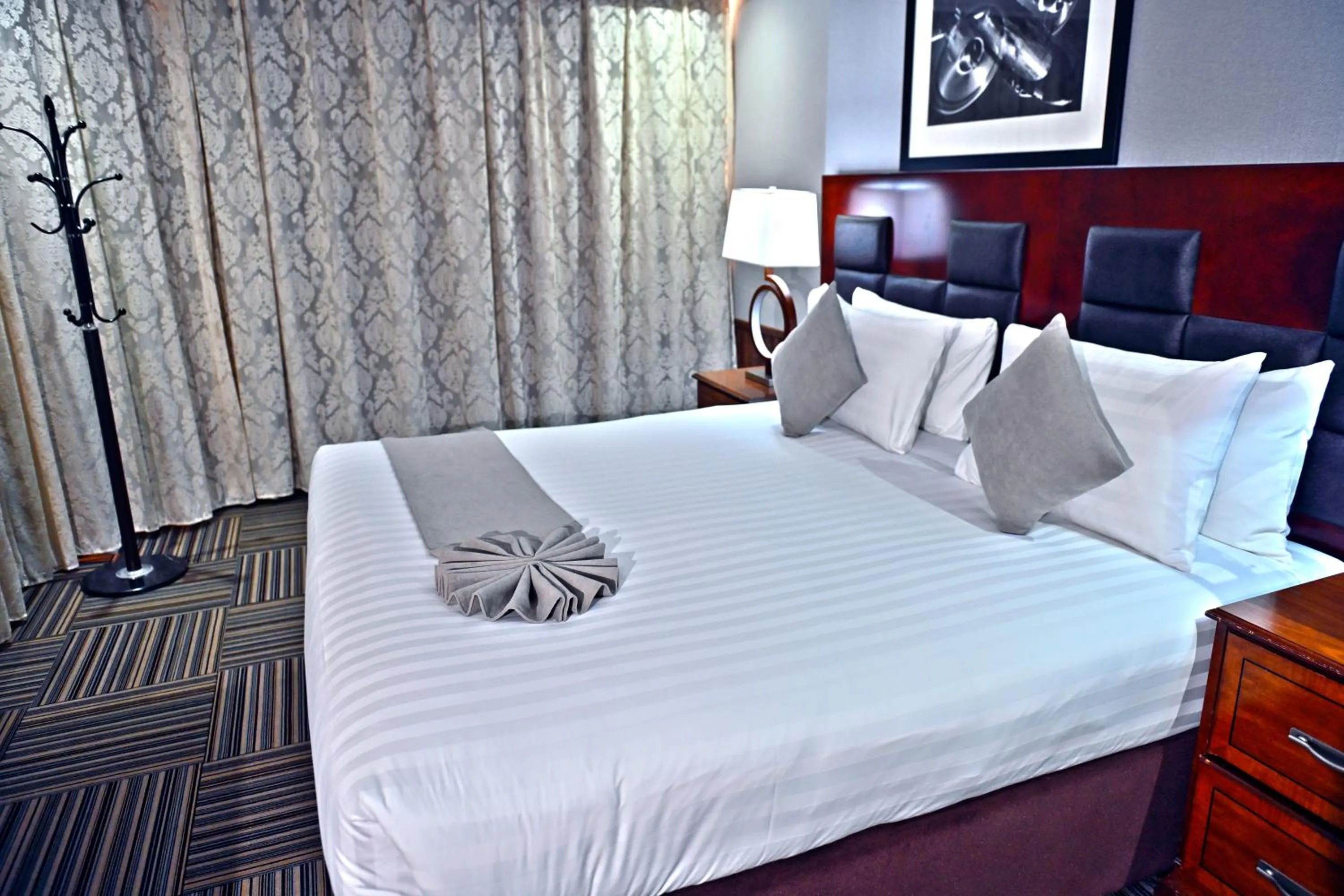 Bed in Ewan Ajman Suites Hotel