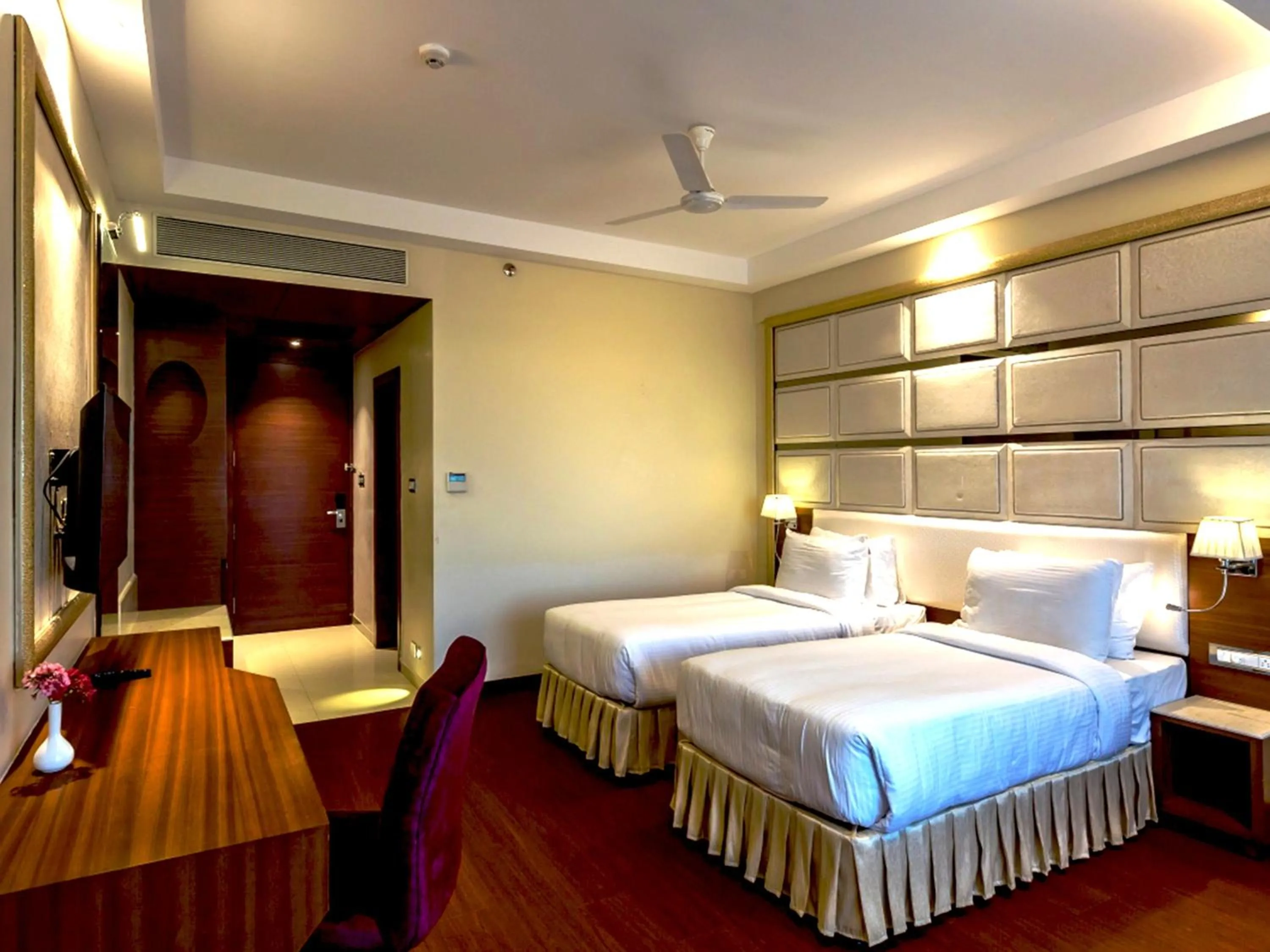 Bed in Hotel Kasturi Orchid