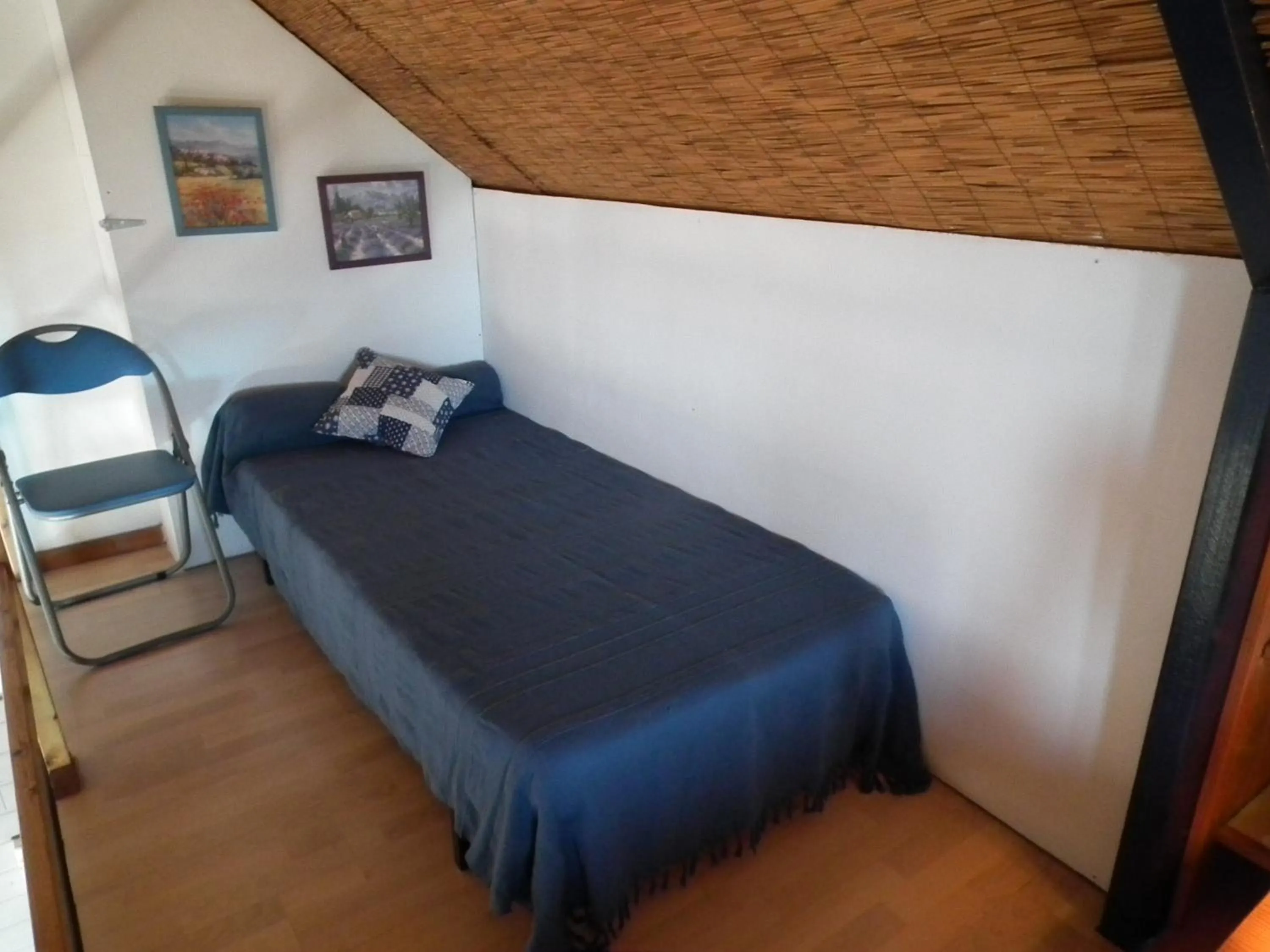 Bed in Le Cardinal des Grands Bleus