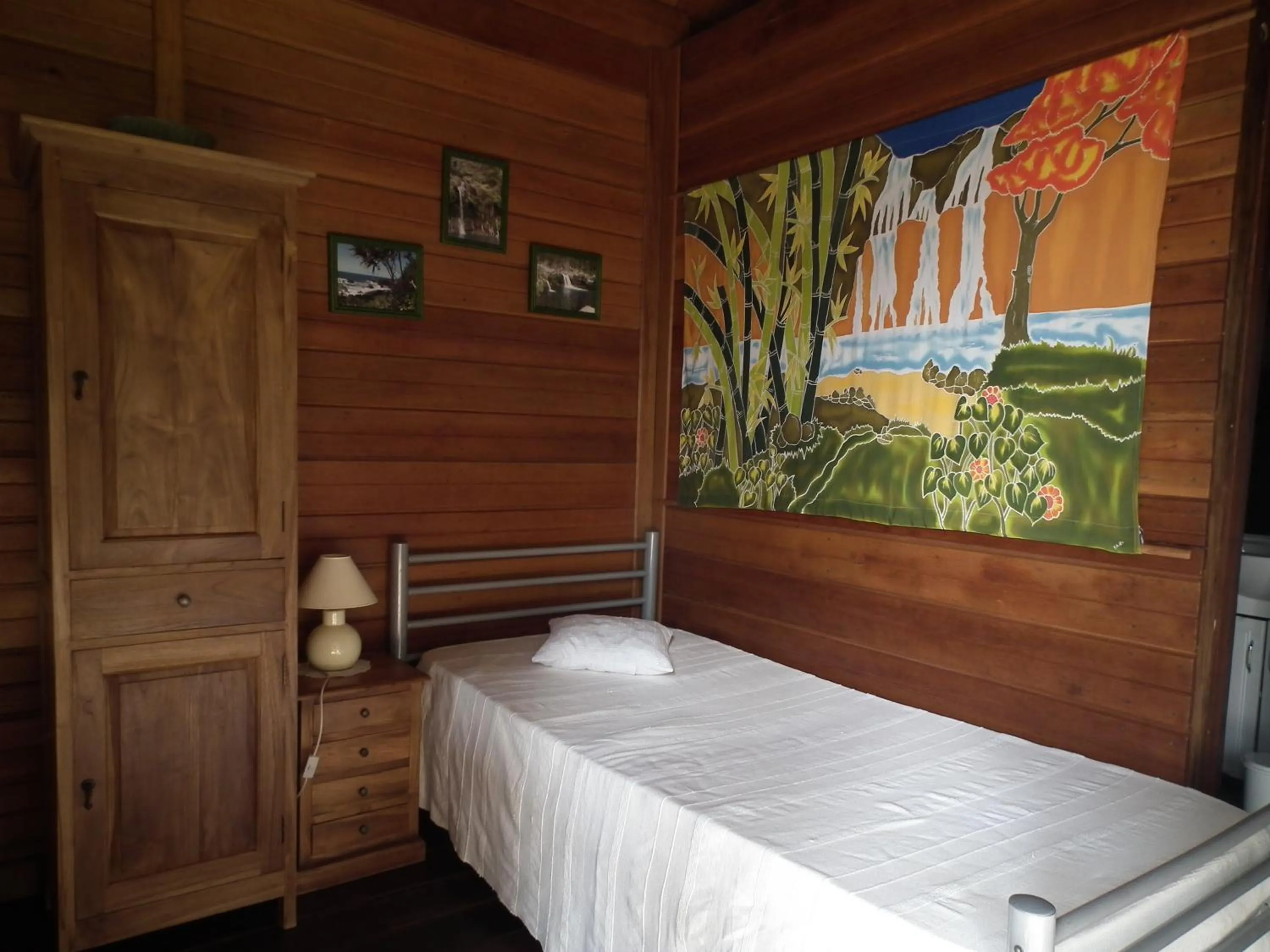 Bed in Le Cardinal des Grands Bleus