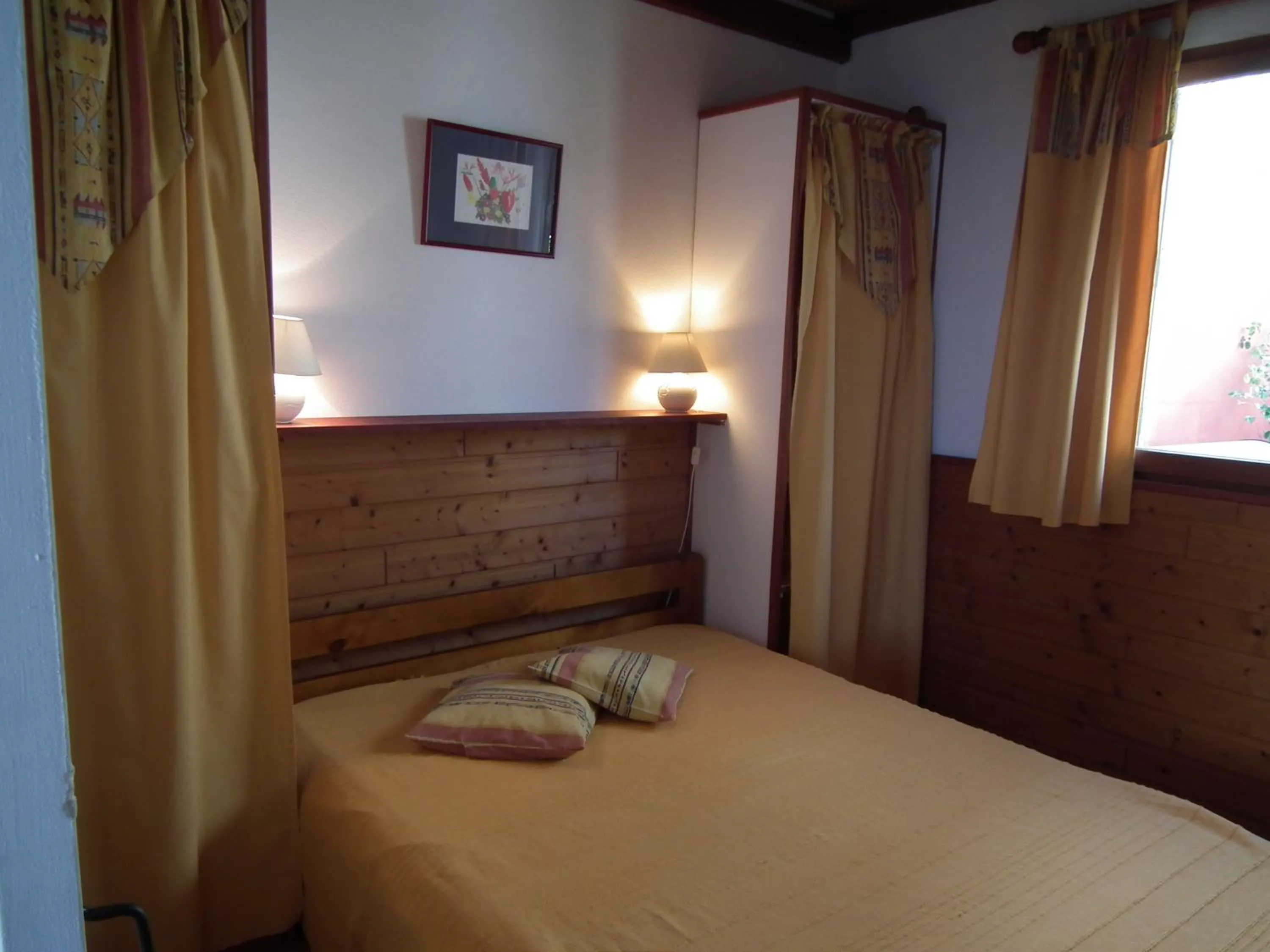 Bed in Le Cardinal des Grands Bleus