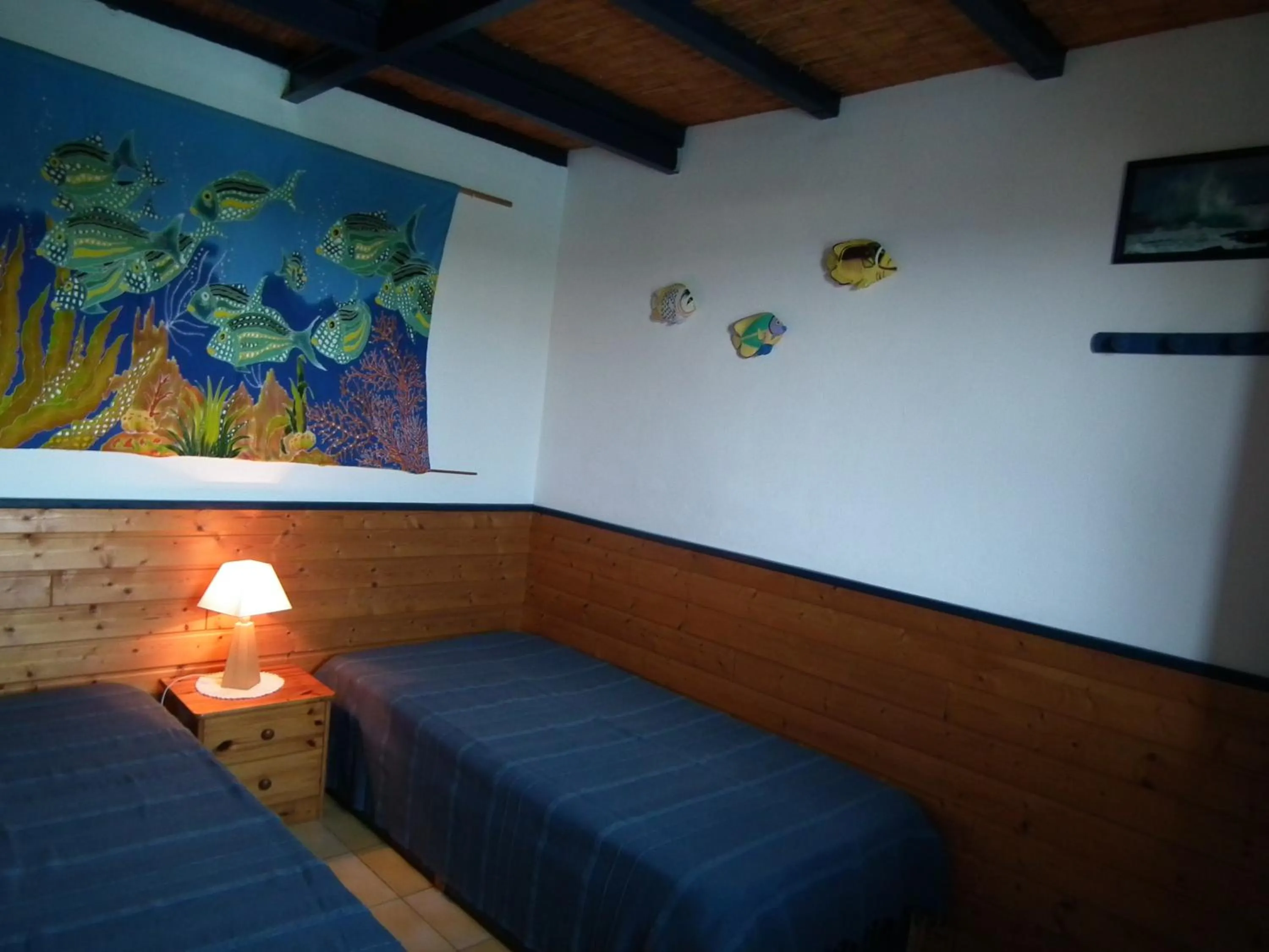 Bed in Le Cardinal des Grands Bleus