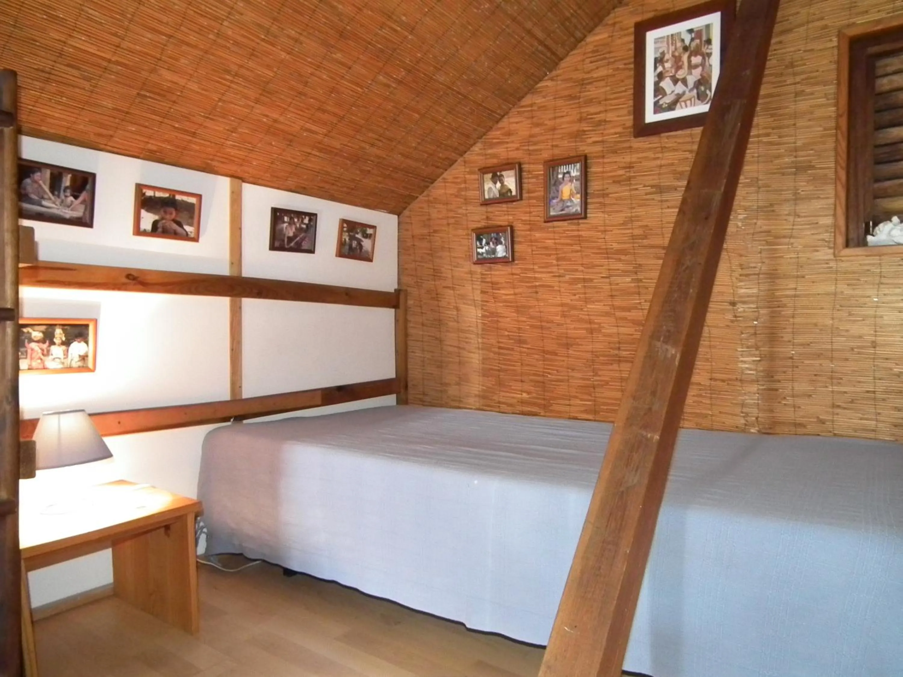 Bed in Le Cardinal des Grands Bleus
