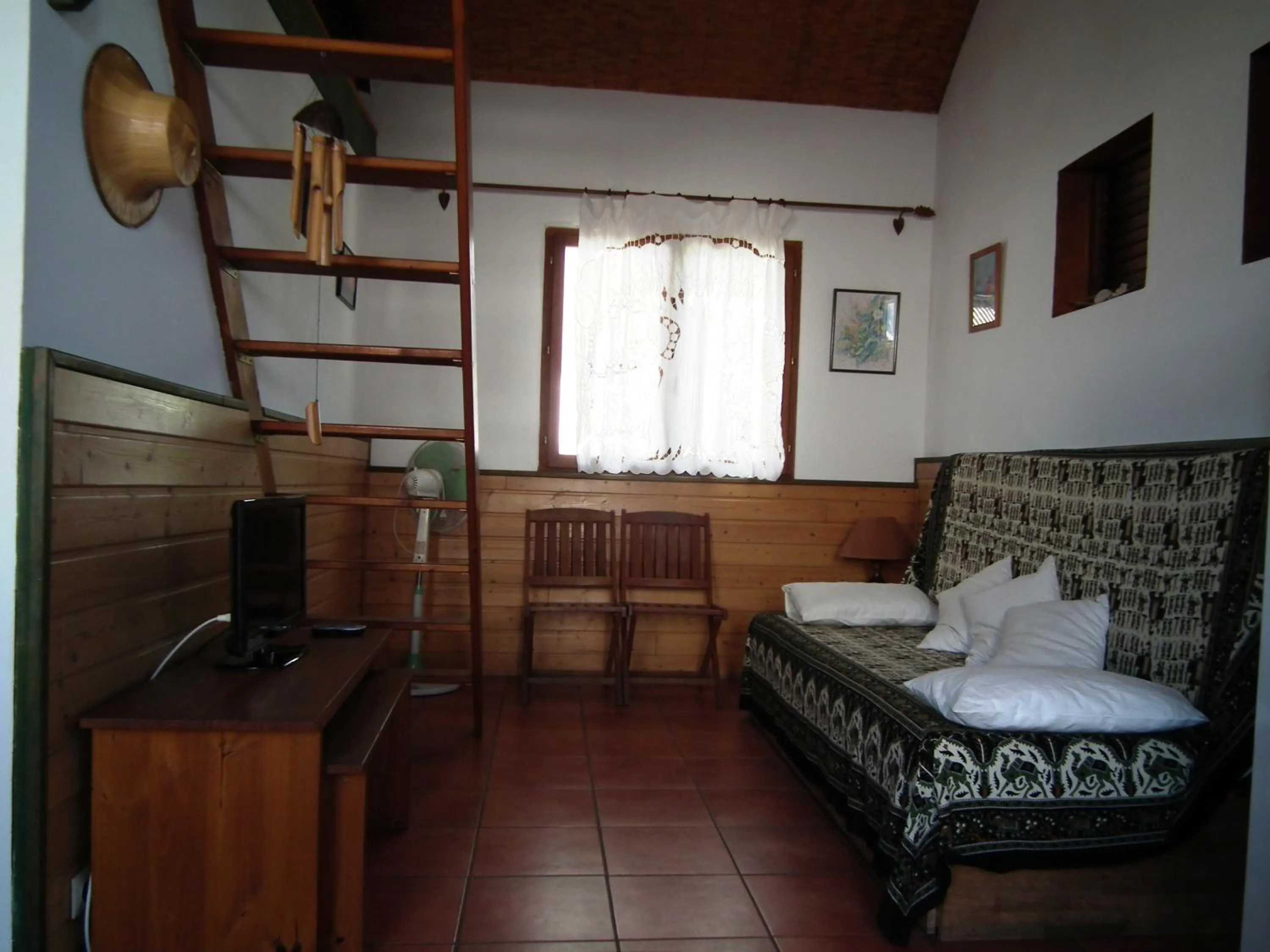Bed in Le Cardinal des Grands Bleus