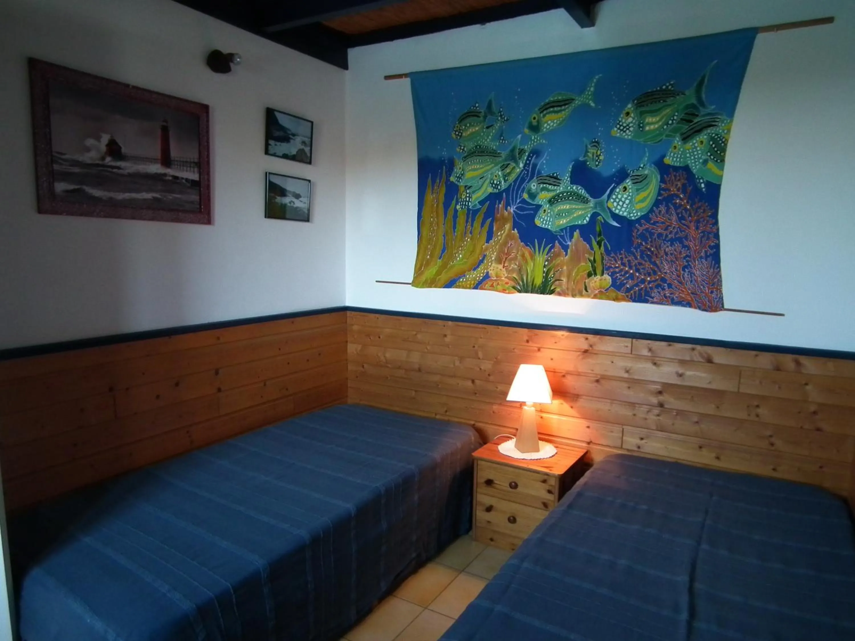 Bed in Le Cardinal des Grands Bleus