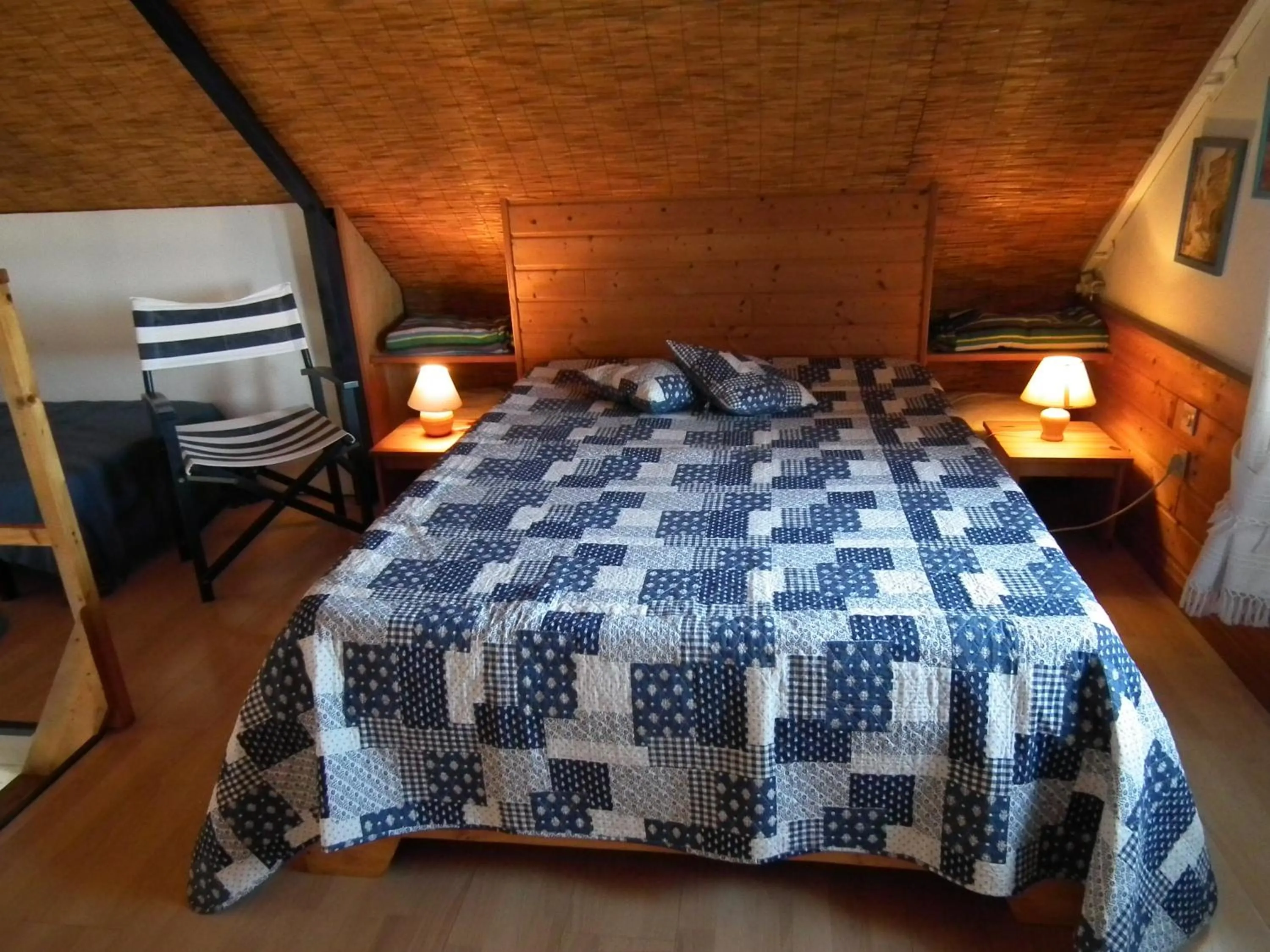 Bed in Le Cardinal des Grands Bleus