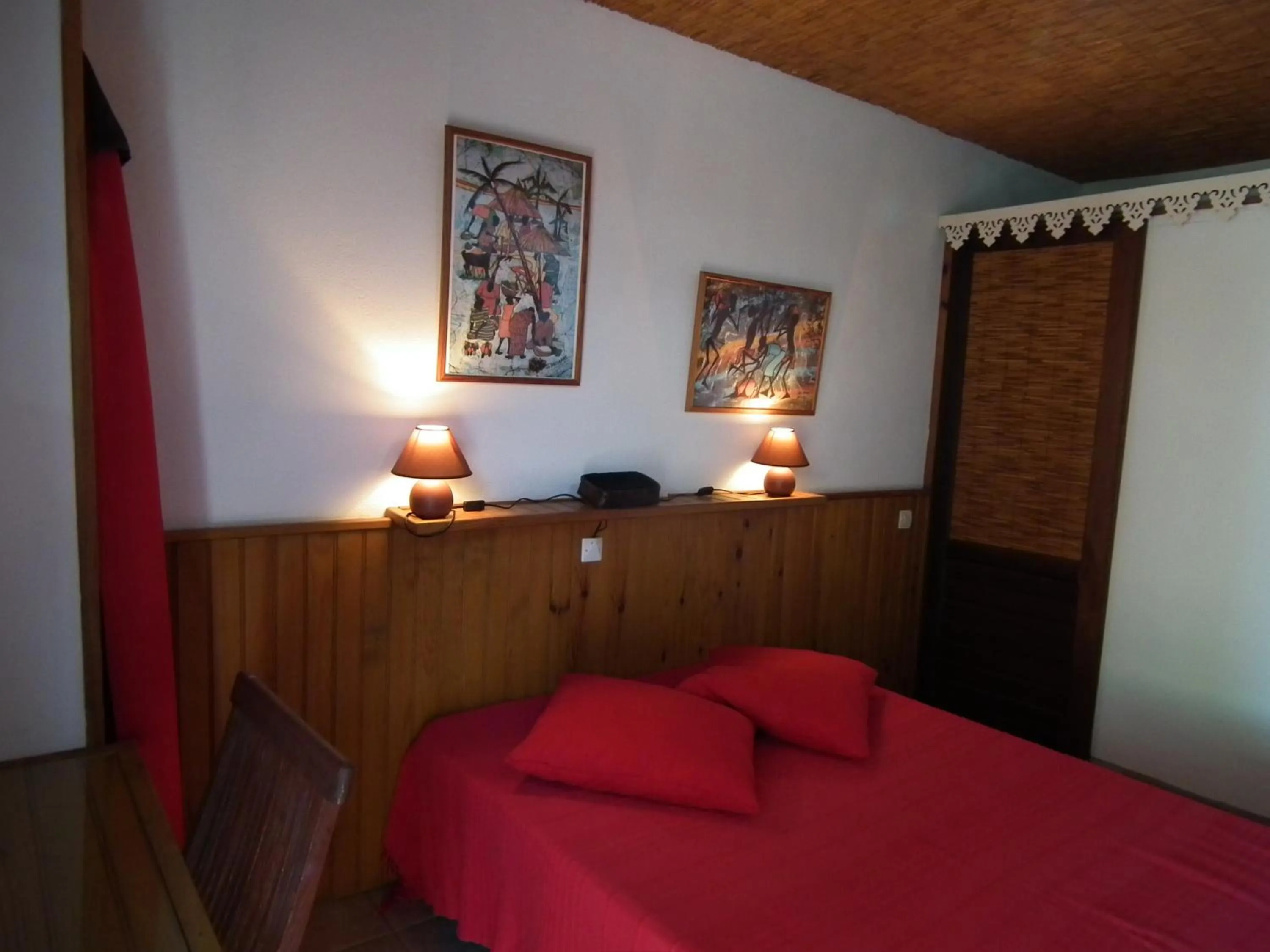 Bed in Le Cardinal des Grands Bleus