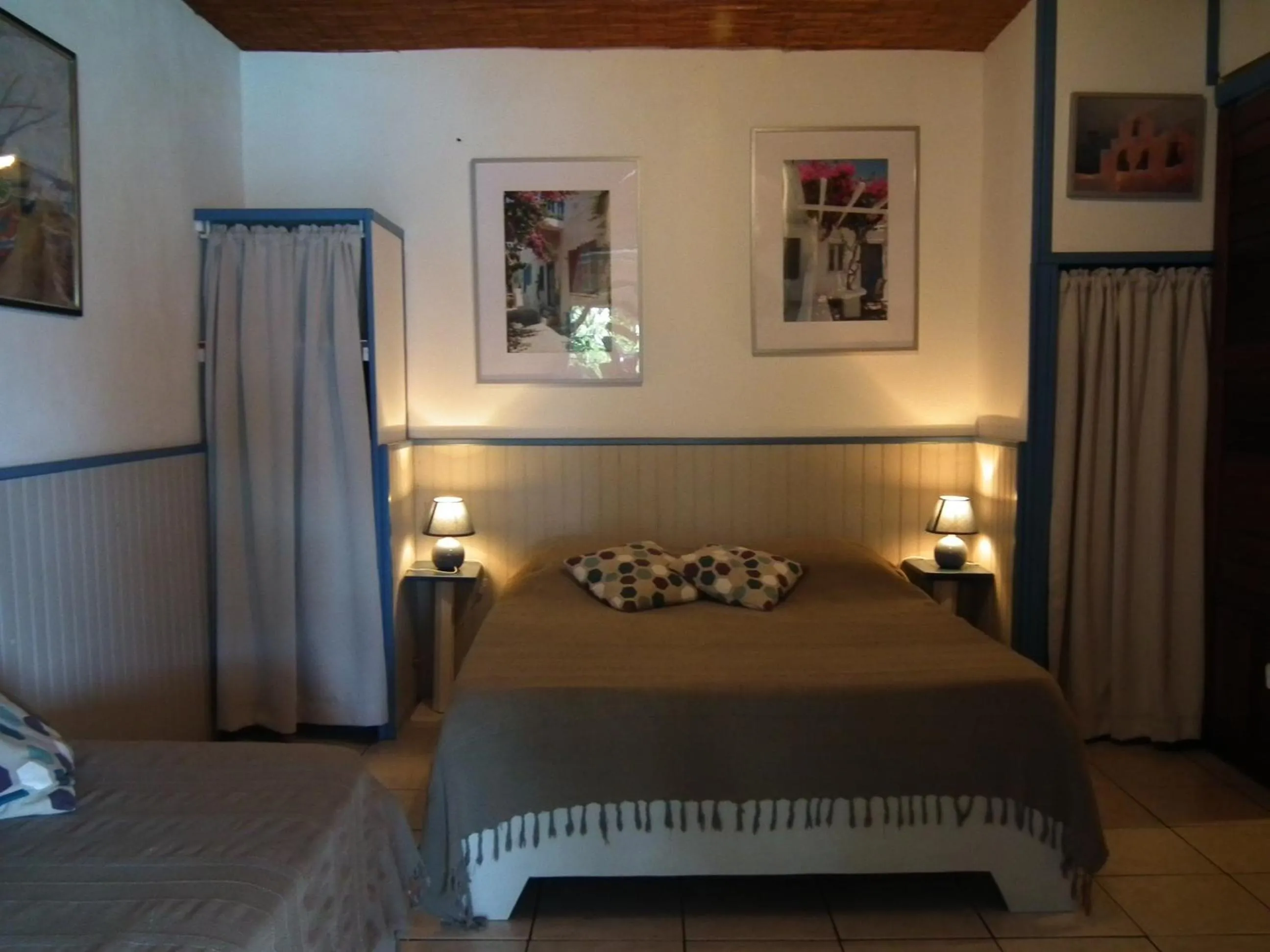 Bed in Le Cardinal des Grands Bleus
