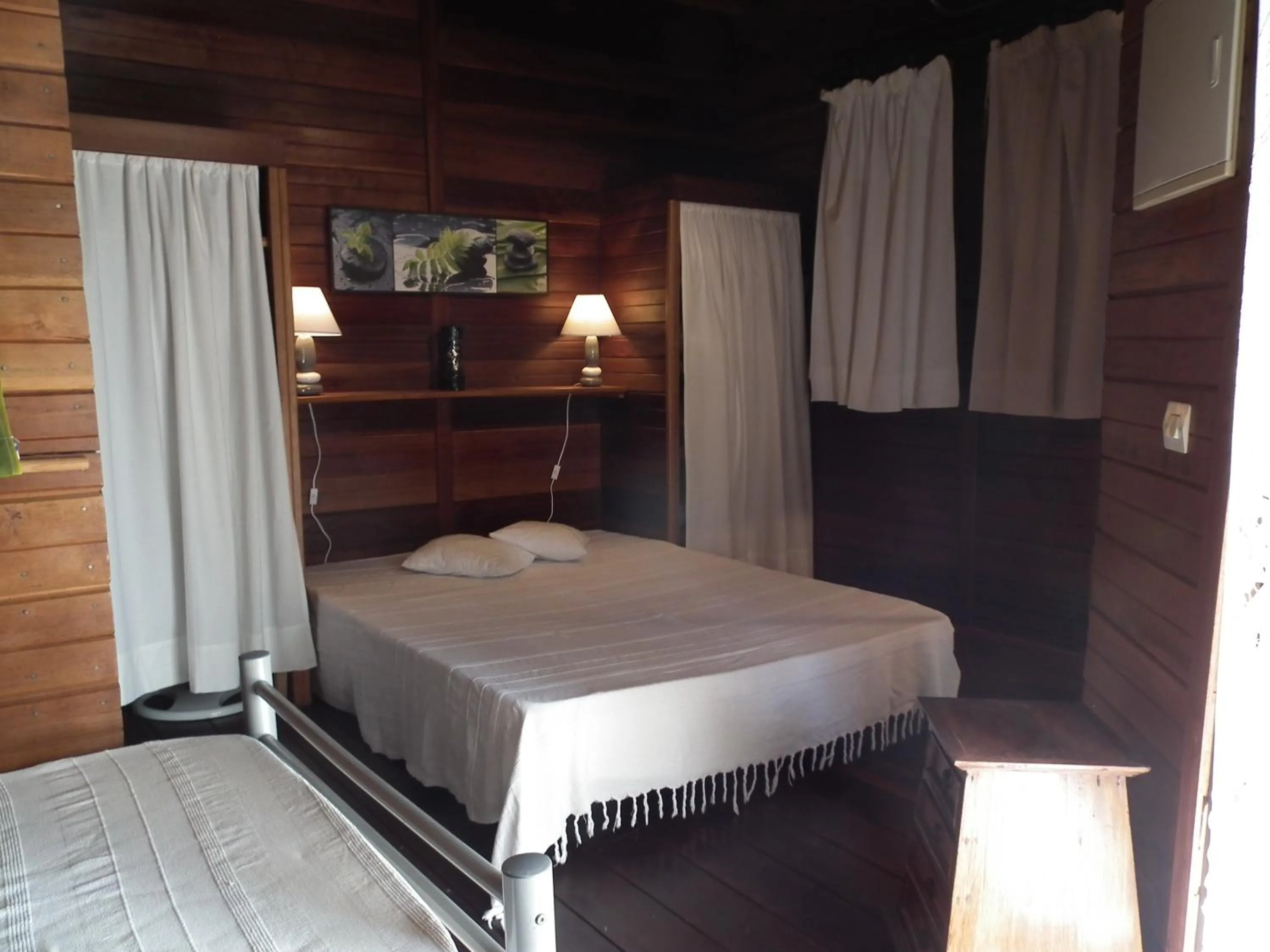 Bed in Le Cardinal des Grands Bleus