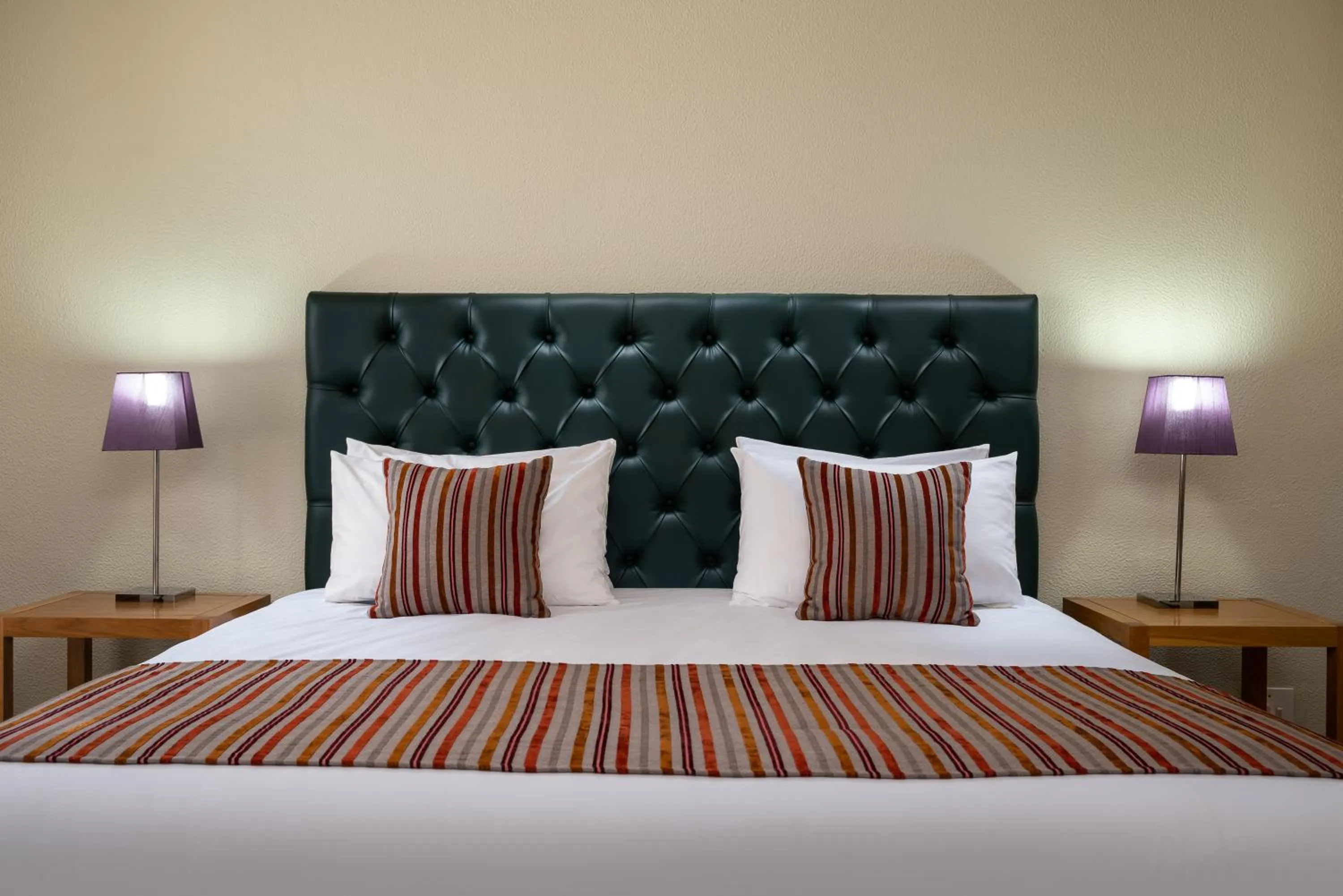 Bed in River City Inn