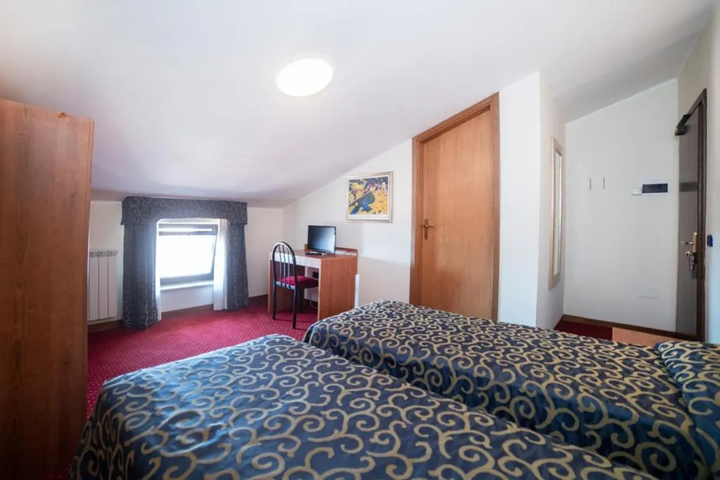 Bed in Hotel Italia & Lombardi