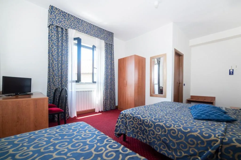 Bed in Hotel Italia & Lombardi