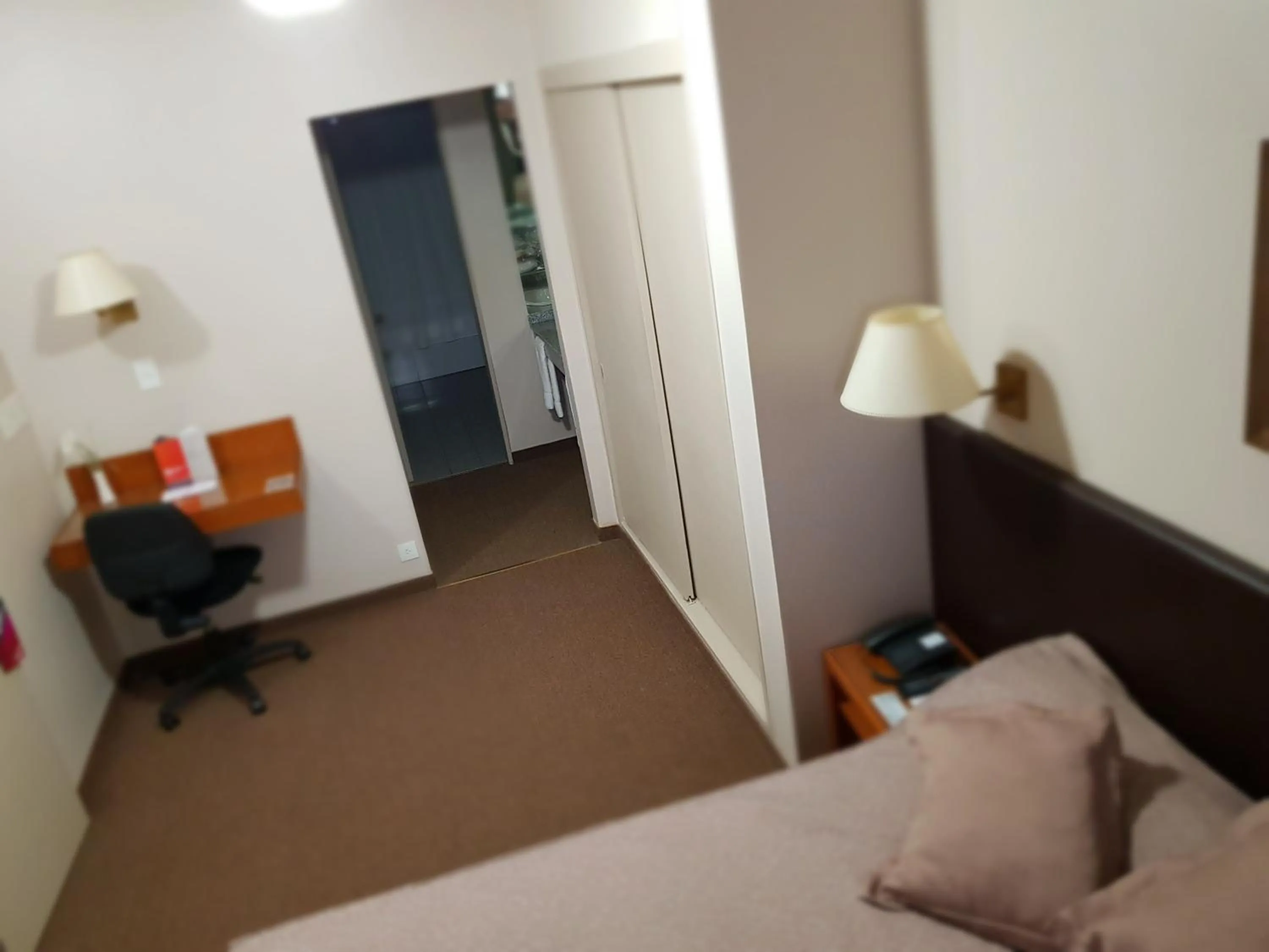 Bed in Comodoro Hotel