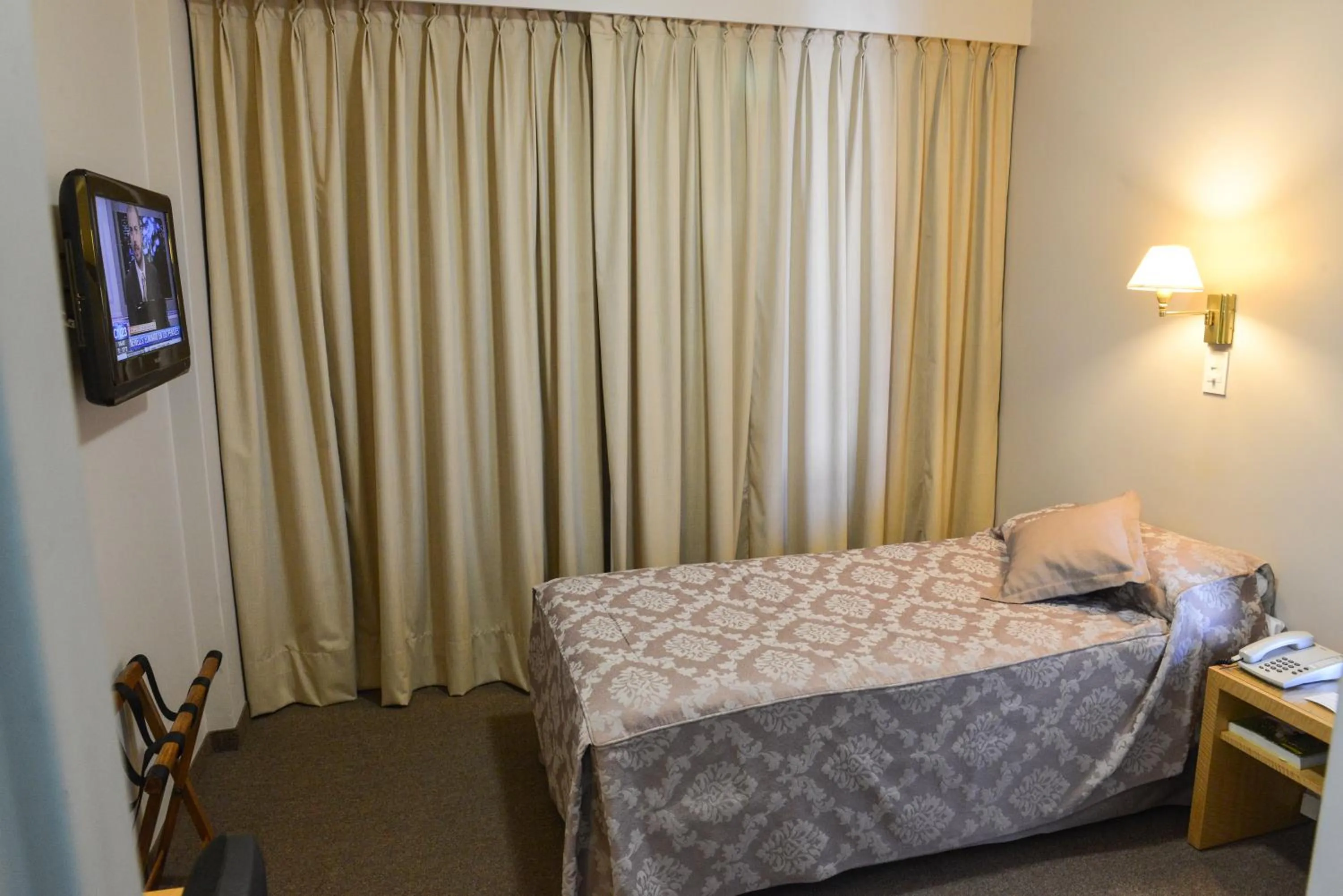 Bed in Comodoro Hotel