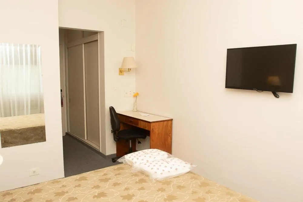 Bed in Comodoro Hotel